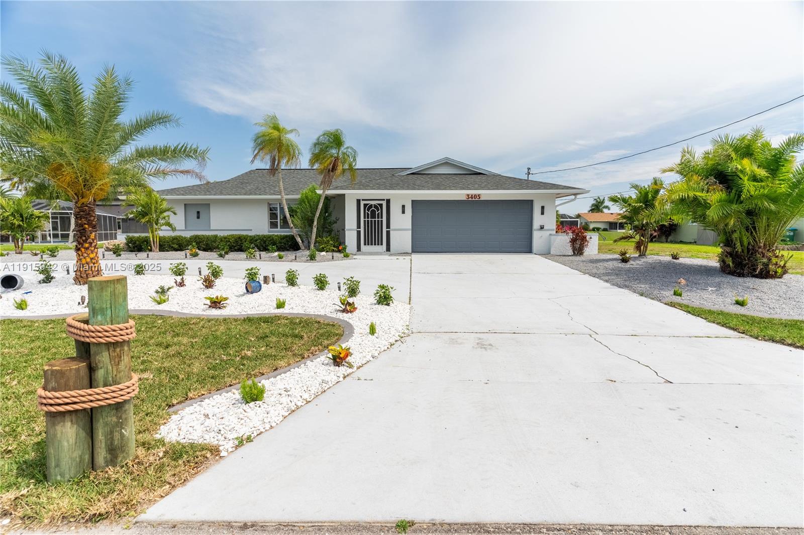 Direct Gulf Access waterfront single family 3/2 house in the exclusive Palaco Grande Development. This triple lot (120 feet of seawall) consisting of a deep-water canal that can accommodate small to large boats, sailboats and yachts (no bridges). Electricity & water is dock side for those mariners who will live or sleep on their boat. Lounge in your resurfaced Gunite concrete pool, enclosed by updated screened in Lanai. Pass food & drinks from the kitchen trough the sliding kitchen windows to serve your guests & family. In 2023 a new roof was installed with front yard landscaping which includes timed led lights for an amazing curb appeal, especially at night. NO mandatory HOA. No Flood insurance required. Only 1 block from malls & restaurants. Get it before its gone.