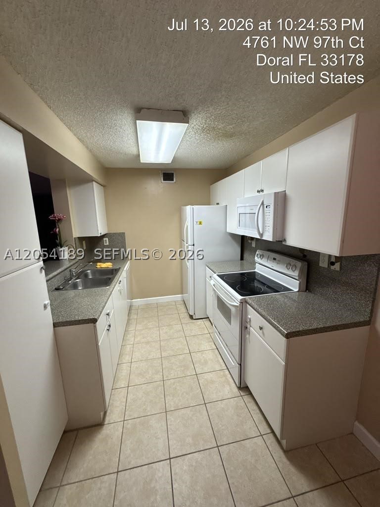 THE GREENS AT DORAL CONDO - Residential Lease