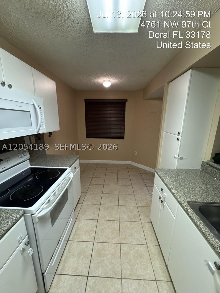 THE GREENS AT DORAL CONDO - Residential Lease