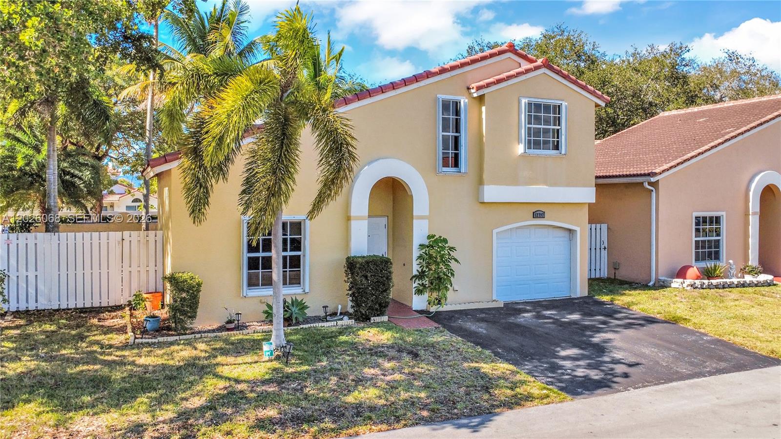 Beautifully maintained corner-lot residence in the highly desirable Savannah community! This move-in ready 3-bedroom, 2.5-bath home offers the perfect blend of comfort, functionality, and insurance-saving upgrades. The first floor features hurricane impact windows and doors, while the second floor is equipped with accordion shutters—ideal for maximizing potential insurance discounts and peace of mind. The spacious primary suite is conveniently located on the first floor with a private bathroom, along with a separate half bathroom for guests. Upstairs, you’ll find two additional bedrooms connected by a Jack-and-Jill bathroom, creating an ideal layout for family or guests. The kitchen features stainless steel appliances and a wine refrigerator perfect for wine enthusiasts and entertaining. Enjoy a spacious 1-car garage, ample living areas, and a low-maintenance corner lot designed for easy living. Located in a well-maintained community near Sawgrass Mills, major highways, dining, and entertainment. Not in a Flood Zone!