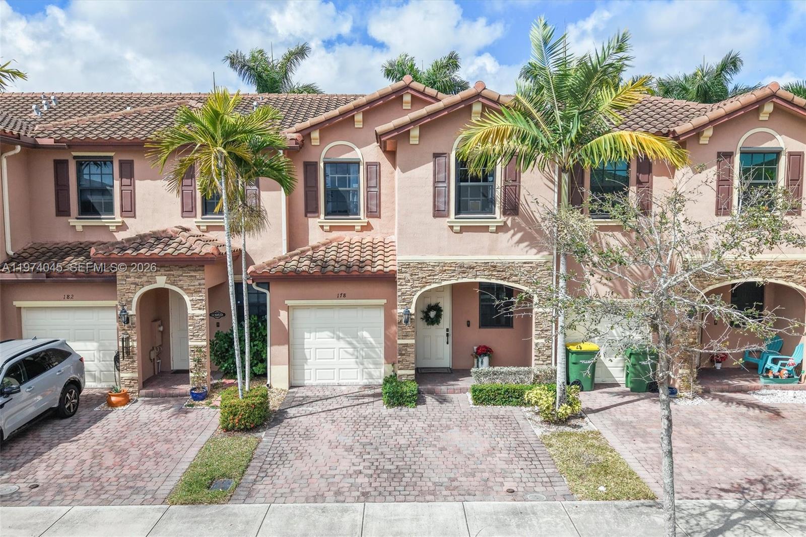 Spacious 3BR / 2.5BA two-story townhouse in a fully gated community in Homestead. This well-maintained home features a functional layout, one-car garage, and comfortable living areas ideal for families or professionals.Upgrades include porcelain tile flooring on the first floor and in bathrooms, a fully renovated primary bathroom with modern glass shower enclosure, updated half bath, and a custom-built walk-in closet. The kitchen has been refreshed with painted cabinetry and updated fixtures, plus upgraded lighting and hardware throughout. Smart home features add extra convenience. Private patio and access to resort-style amenities. Conveniently located near shopping, dining, and major roads.