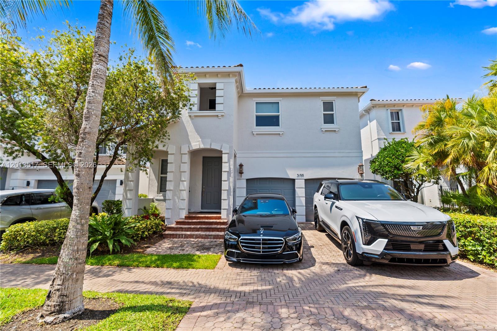 Exquisitely reimagined 5-bedroom, 4.5-bath residence in the prestigious gated community of Aventura Lakes. This exceptional home blends contemporary design with refined finishes, offering an elevated living experience in one of Aventura’s most desirable neighborhoods. Featuring three en-suite bedrooms, a two-car garage, and additional parking for up to three vehicles, the home is filled with natural light and equipped with impact-resistant glass throughout. The open-concept layout is ideal for entertaining, highlighted by a sleek modern kitchen with stainless steel appliances and custom cabinetry that flows seamlessly into the main living areas. 
Upgrades include 75” white porcelain flooring, a glass staircase, imported solid wood magnetic doors, custom closets, designer window treatments, and a fully updated electrical, plumbing, and lighting system. Dual-zone A/C provides enhanced comfort and efficiency. The spacious primary suite offers a spa-inspired bathroom with an oversized vanity and walk-in shower. A fully finished, air-conditioned garage adds flexibility for a gym, playroom, or additional living space. The backyard offers ample space for a pool and outdoor living. Residents enjoy 24/7 security, clubhouse, fitness center, two pools, and beautifully maintained grounds. HOA includes cable, internet, and landscaping. Ideally located minutes from Aventura Mall, fine dining, A-rated schools, houses of worship, and the beach.