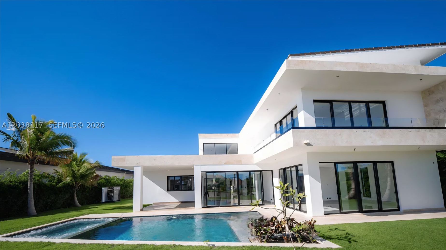 New villa with golf and sea views in Las Palmas, Cap Cana

Modern brand new villa located in the exclusive community of Las Palmas, within Cap Cana, with stunning views of the golf course and the Caribbean Sea. The property combines contemporary architecture, high-end finishes and a privileged location.

It has 4 bedrooms, 5.5 bathrooms and approximately 600 m² of construction (6,458 ft²), located on a large lot of 1,803 m² (19,407 ft²).

Its open spaces filled with natural light, along with floor-to-ceiling glass doors, harmoniously connect the interior areas with the pool, garden and exterior terraces.