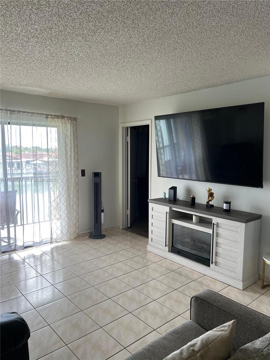 Location, well maintaine Condominium! This spacious 2-bedroom, 2-bathroom second -floor unit with stoning view to the lake, offers 800 sq ft of living area, a layout that is rarely available in the community. The property features modern finishes with tile flooring throughout, an updated kitchen with stainless steel appliances, and a bright open living and dining area. Enjoy a private terrace, perfect for relaxing or entertaining. The unit includes one assigned parking spaces, adding extra convenience for owners or tenants. Currently occupied by a long-term excellent tenant, making it a great opportunity for both investors and end users. Ideally located in the heart of Hialeah, close to major highways, shopping, restaurants, and everyday conveniences.
