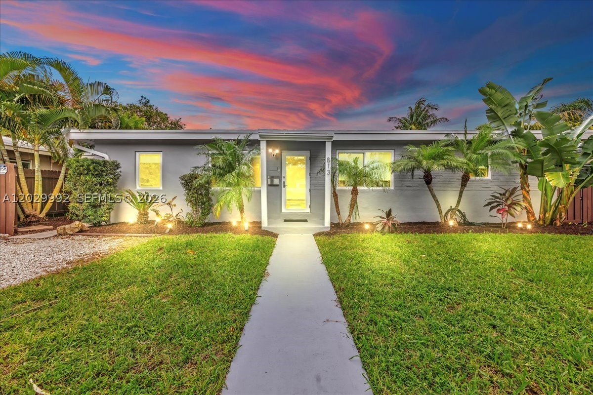 Discover the perfect blend of style, comfort, and South Florida charm in this beautifully updated 5-bedroom, 3-bath residence. Bathed in natural light, the home showcases large impact windows and expansive glass doors that create a bright, airy ambiance while seamlessly connecting indoor and outdoor living. A modern kitchen with sleek contemporary finishes serves as the heart of the home, ideal for both everyday living and effortless entertaining. Outside, a true tropical oasis awaits, featuring an oversized free-form pool surrounded by lush landscaping that evokes the feel of a private resort. Thoughtful upgrades include impact-rated windows and doors, a 2021 roof, tankless water heaters installed in 2025, offering both comfort and peace of mind. With no HOA restrictions, this property provides the freedom and flexibility today's buyers desire. Whether hosting poolside gatherings, enjoying quiet mornings in your backyard retreat, or simply embracing the Florida lifestyle, this home delivers an exceptional living experience. Ideally located just minutes from Wilton Manors, Las Olas Boulevard, Downtown Fort Lauderdale, Holiday Park, Hugh Taylor Birch State Park, and Fort Lauderdale Beach, Ft Lauderdale airport, you'll enjoy convenient access to some of the area's best dining, shopping, entertainment, and recreation.