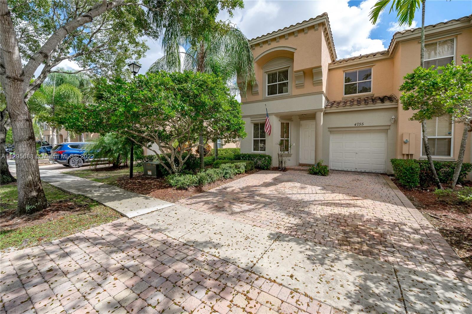 A must see! Spectacular lakefront views from this stunning 3 bed 2.5 bath corner unit townhome in Regalo. One of the most sought-after gated communities in Miramar. Amenities upstairs include a spacious primary suite with tray ceilings and  large walk-in closet, a spacious den/hallway and laundry room.  The open concept dinning room & family room, is perfect for entertaining. Kitchen features stainless steel appliances. One car garage and double car driveway. Just a few minutes from I-75, Turnpike, shops, and restaurants.