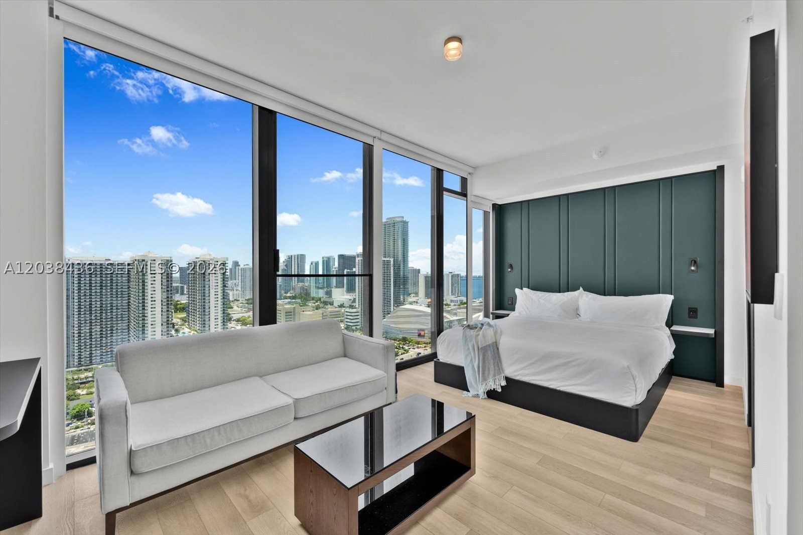 Ultra-rare high floor corner studio at E11EVEN® Club Hotel & Residences offering 474 SF of fully furnished living space and desirable northeast-facing views of Biscayne Bay. Delivered with the complete OS&E package, this residence is ready for immediate use and offers exceptional flexibility for an end user, seasonal retreat, or income-producing investment through the hotel program. Interiors feature floor-to-ceiling glass, modern finishes, and the elevated hospitality-driven design that defines E11EVEN. Residents enjoy access to a true resort lifestyle with the E11EVEN Day Club, rooftop pool and dining, Chopra Spa & Studio, fitness center, concierge, valet, curated dining, Beach Club, and exclusive owner privileges. Prime Downtown Miami location, moments from Miami Worldcenter, Brightline High Speed Rail Station, Kaseya Center, Brickell, Wynwood, Miami Beach, shopping, dining, and, of course, nightlife.