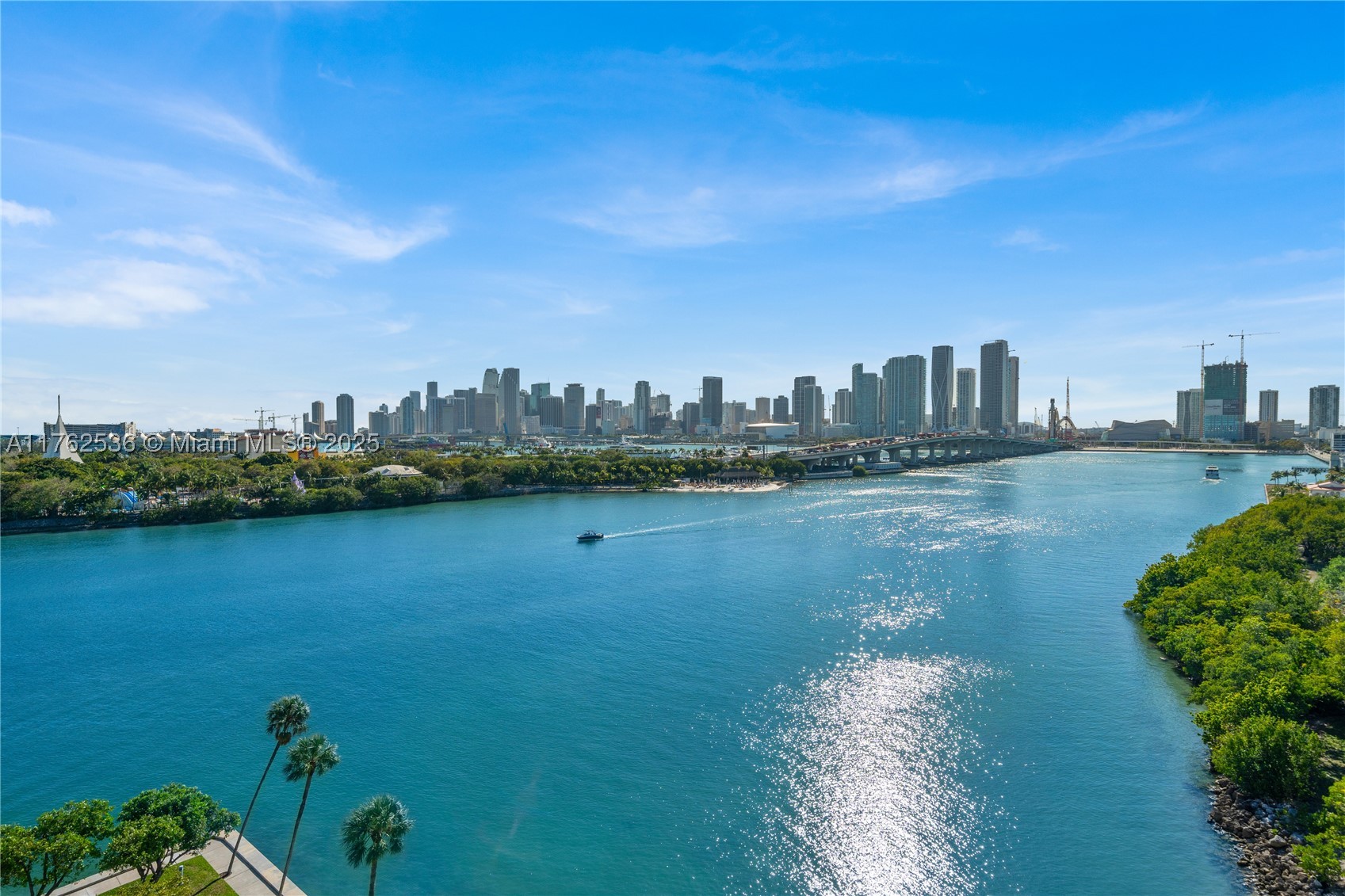 MODERN INDUSTRIAL DESIGN DUPLEX WITH BREATHTAKING MIAMI SUNSET VIEWS OVER THE SPARKLING BAY & MIAMI SKYLINE ON THE COVETED VENETIAN ISLANDS! Upgraded Two-Story 1 Bed, 1.5 Bath Townhouse in the Sky features Stylish Industrial Interior Design finishes like Exposed Cement, Plexiglass Staircase & Venetian Plaster throughout. This West-Facing Residence enjoys Stunning Bay & Park Views from Floor to Ceiling Windows on Both Levels. White & Bright Open Kitchen with New Stainless Steel Appliances & Breakfast Bar. Modern Bedroom with Terrace + Bathroom with Rainshower. 1000 Venetian Way is a Boutique Building with World-Class Amenities such as Concierge, Valet, Pool, Gym, Tennis Courts, Spa + Dog Park ideally located on the Venetian Causeway between Downtown Miami & South Beach.