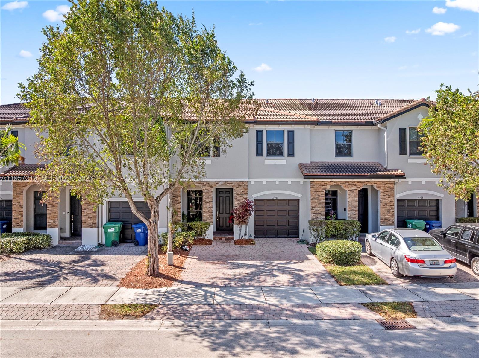 Beautiful 3-bedroom, 2.5-bath unit ideal for primary living or investment. Spacious and comfortable floor plan with ample closet and storage space. No rear neighbors and front-facing green area, offering added privacy and open views. Located within a private block of only five townhomes, with abundant guest parking nearby. Unit is in impeccable condition inside and out, reflecting consistent care and maintenance. Community offers resort-style amenities including clubhouse, large pool, children’s water park, gym, barbecue areas, kids’ playroom and basketball court. A+ rated charter schools within the community. Conveniently located steps from Publix and minutes from Aldi, with easy access to Florida Turnpike, multiple main roads, dining and Black Point Marina. Association fee $84/month. Seller motivated.