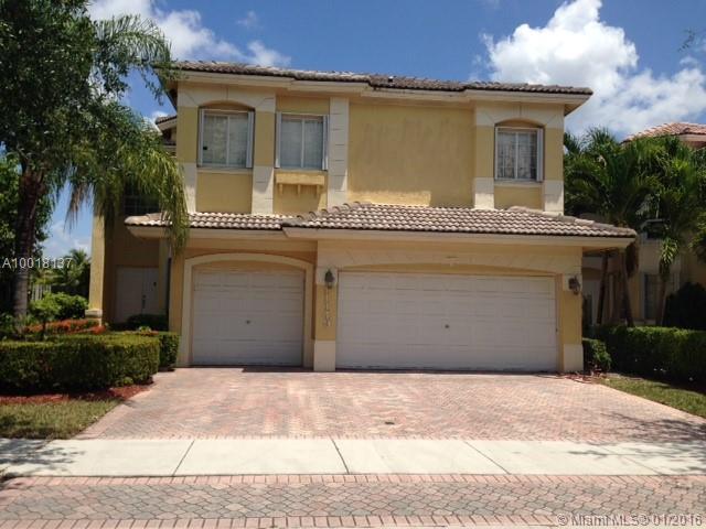 SPECTACULAR LUXURY LAKE FRONT MARTINIQUE MODEL IN DORAL ISLES CATALINA. ENJOY RESORT STYLE LIVING IN THIS 2 STORY, 5 BEDROOMS & 3 FULL BATHS, 3 CAR GARAGE. ONE FULL BEDROOM & BATHROOM DOWNSTAIRS, KITCHEN WITH GRANITE COUNTERTOPS, STAINLESS STEEL APPLIANCES, CERAMIC & WOOD FLOORS, HIGH CEILINGS, PAVED PATIO WITH GREAT ROOM FOR A DECK EXTENSION. GATED COMMUNITY WITH SALT WATER W/A BEAUTIFUL CASCADE, GYM...NEAR A+ SCHOOLS, CENTRALLY LOCATED.