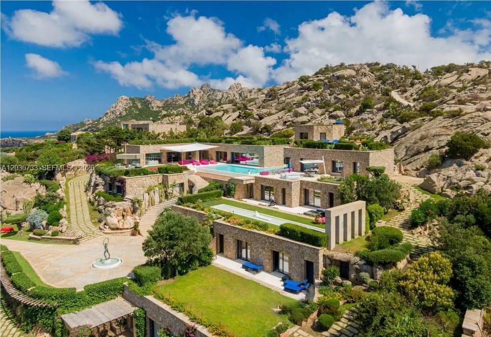Massimiliano Mlekus Cocchi  is proud to present:
VILLA PORTO ROTONDO 
 • Costa Smeralda • Sardinia, Italy

Perched above the crystal-clear waters of the Costa Smeralda, is an extraordinary Mediterranean estate offering unparalleled privacy, breathtaking sea views, and one of the most prestigious locations in all of Italy.

Set on approximately 20 acres of private land, this remarkable property features over 1,400 square meters (15,070 sq ft) of living space, seamlessly blending contemporary architecture with the natural beauty of Sardinia's coastline.

Designed for the most discerning buyers, the estate offers:

20 Acres of Private Grounds
1,400 m² / 15,070 Sq Ft Interior Space
Panoramic Mediterranean Sea Views
Private Helipad
Resort-Style Swimming Pool & Spa
Sauna & Wellness Area
Designer Furnishings
Outdoor Entertainment Areas
BBQ Pavilion
Extensive Terraces & Patios
Security System
Six-Car Parking Capacity
Exceptional Privacy

Located in Porto Rotondo, just minutes from the world-famous destinations of Porto Cervo, Costa Smeralda Marina, and some of the most exclusive beaches in the Mediterranean, Villa Li Ruini represents a rare opportunity to own one of Sardinia's premier luxury estates.

A private sanctuary where luxury, nature, and the Mediterranean lifestyle become one.