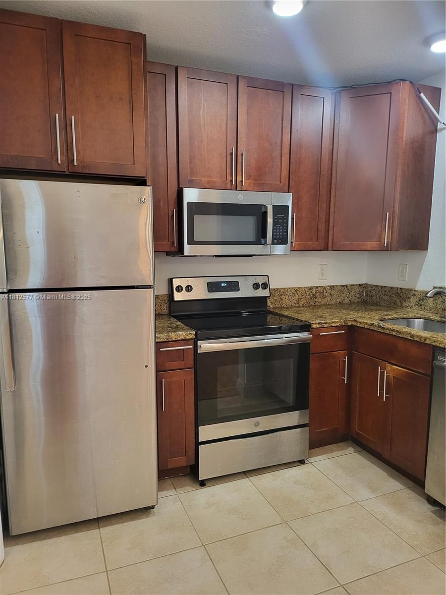 RITZ ROYAL PALM CONDO - Residential