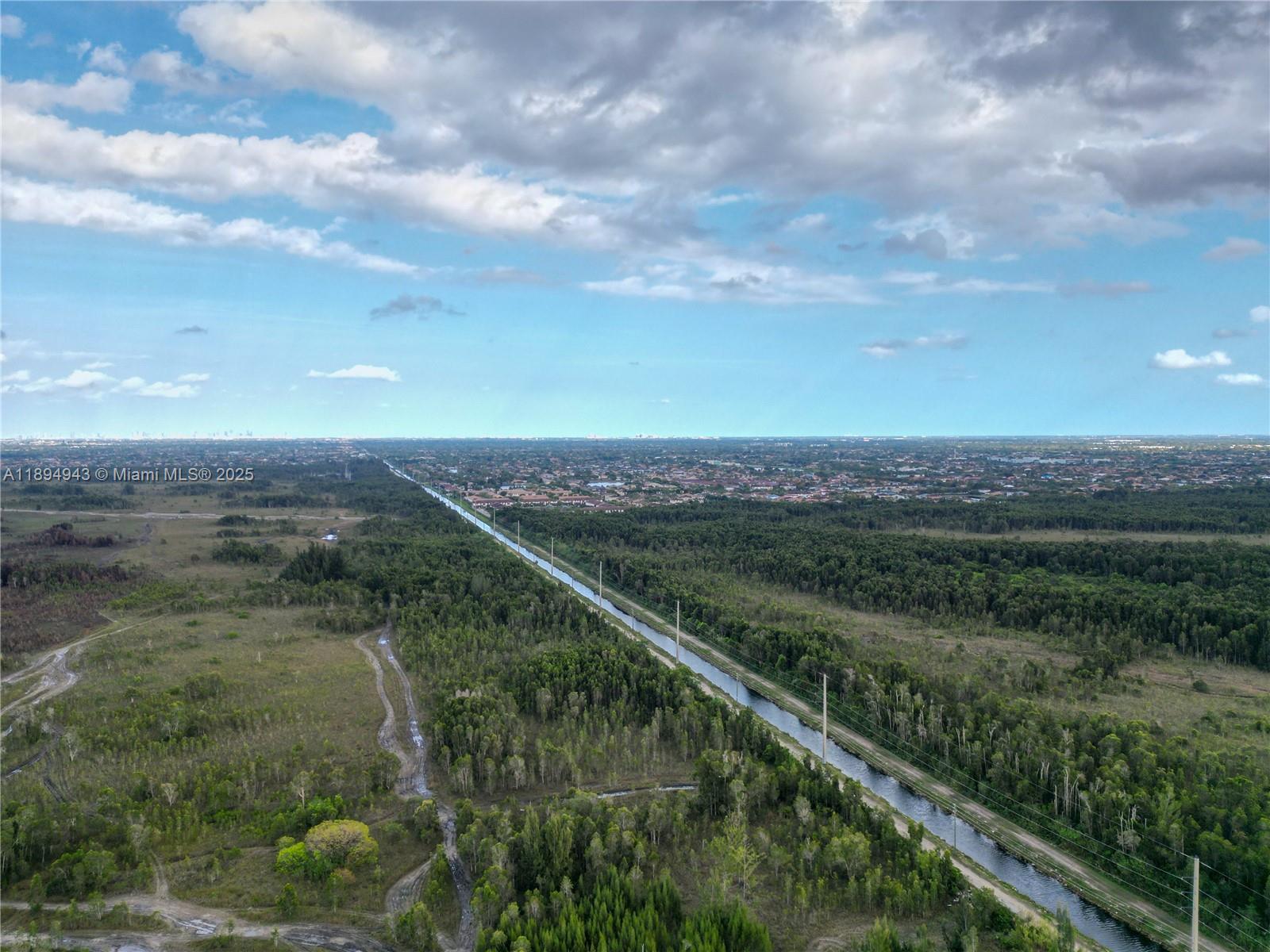 MIAMI EVERGLADE LAND COMP - Land