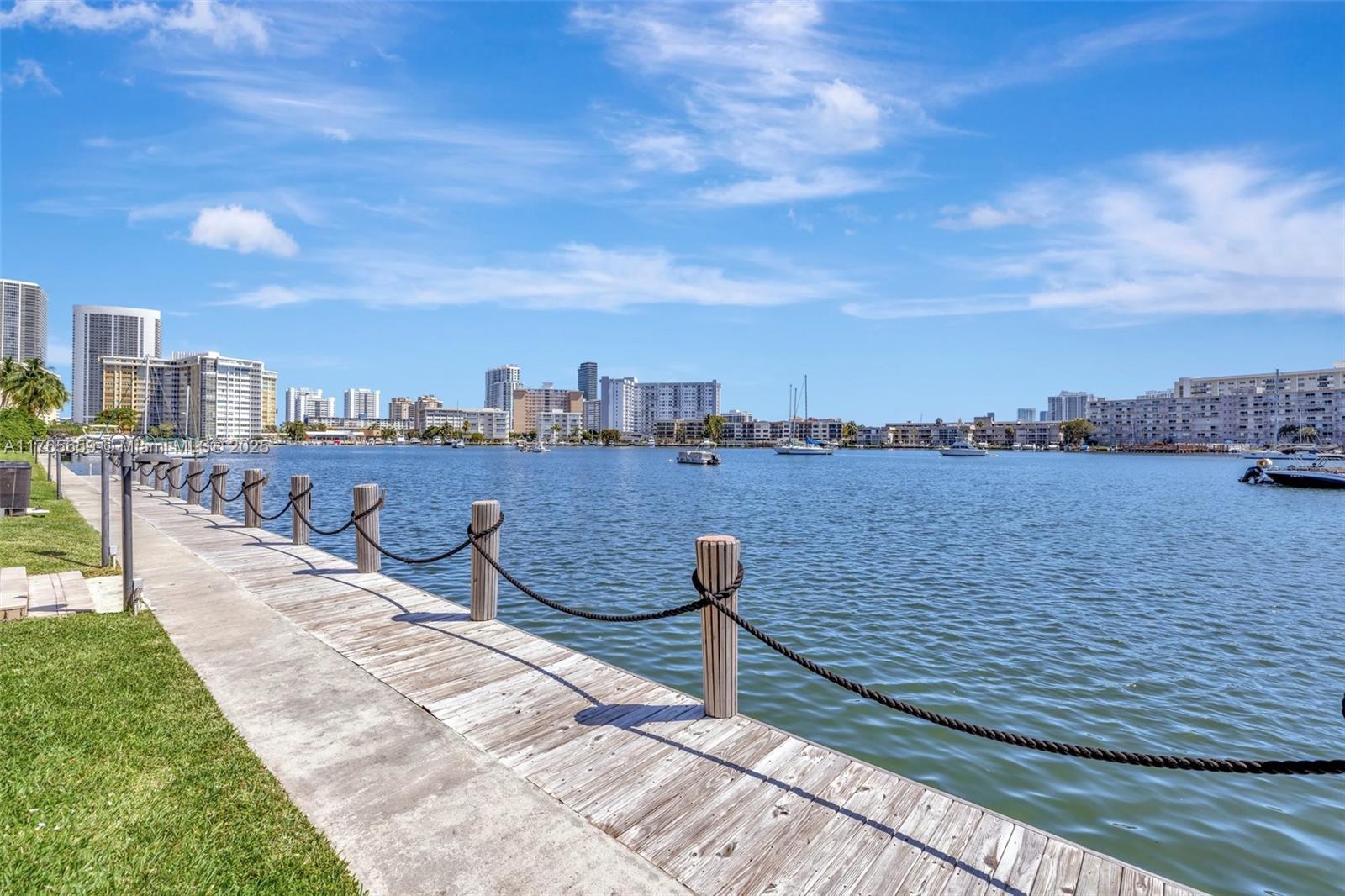 1st floor unit at the all ages Yacht Harbor community, walk directly in from your parking space.   Owner financing available w/30% down. Boat dockage available, spacious living & dining room, patio facing south allows you to walk directly out to the pool and docks ,assigned parking, heated pool, low hoa fees, no land lease, new Roof 2024. walk right out to beach, shopping, dining, entertainment, close to I-95 and public transportation, beachside. Perfect for end user, or 2nd home.  No renting first 2 years of ownership.