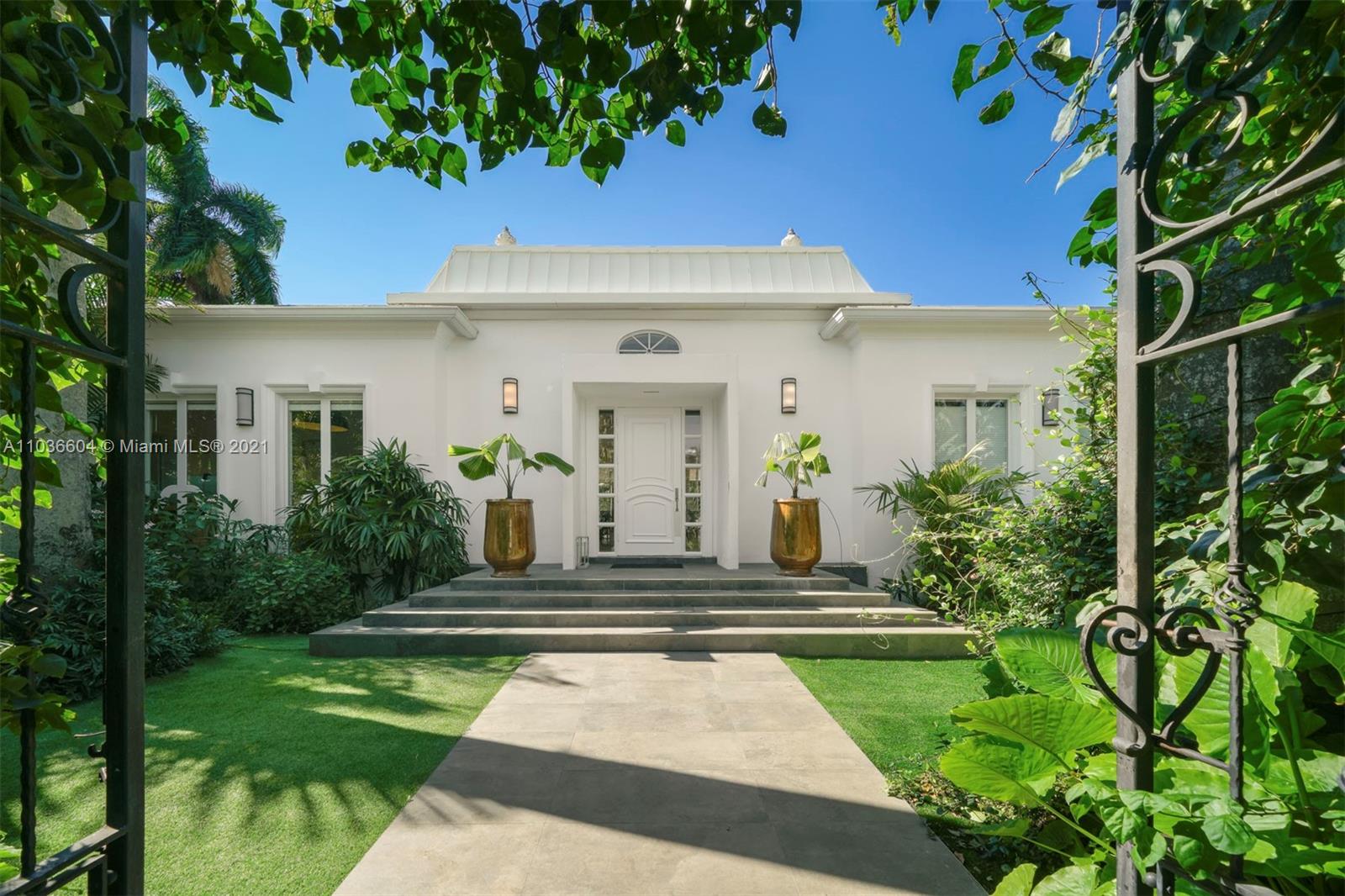 Elegant and dramatic pool home on Fabulous La Gorce Island.  Total of 6 bedrooms, 5 in the main house plus a separate outside loft bedroom all in a stunning French Chateau setting. Big beautiful rooms with volume ceilings, impact windows and doors, plus hardwood floors throughout. Formal living area, relaxing den, open gourmet kitchen, and an abundance of natural light. Big beautiful French Doors surround the home and allow for easy access to the exquisite private pool and  outdoor area, flawless for entertaining, outdoor dining, relaxing, or family fun.  A perfect move in condition home in a perfect setting.