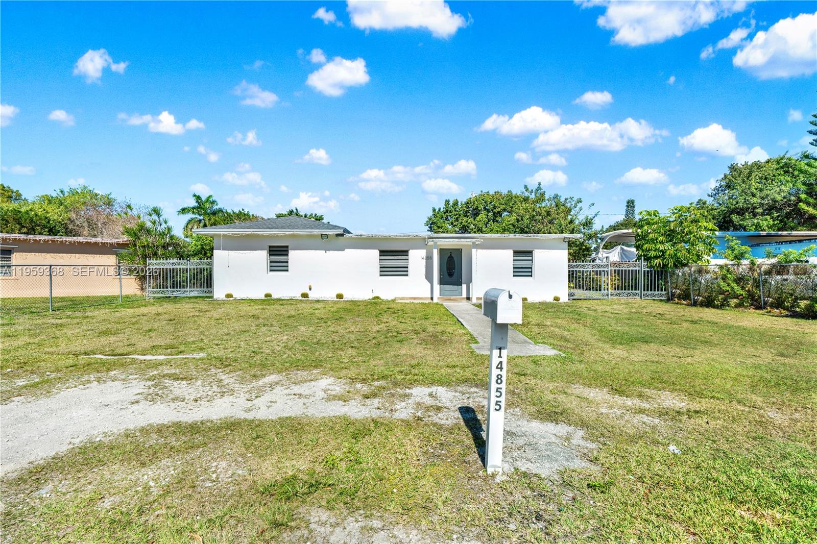 BEST DEAL IN HOMESTEAD! Incredible opportunity to own a spacious one-story 5-bedroom, 3-bath home.  Natural lighting throughout the home. Newer roof and impact windows add long-term value and peace of mind. The kitchen includes granite countertops, a center island, and stainless steel appliances.  Enjoy a large backyard room for a pool with rear access, ideal for parking your boat, RV, or trailer. No HOA. Located in a great neighborhood with a rare turn-key opportunity with built-in value. Easy to show seller incentives.