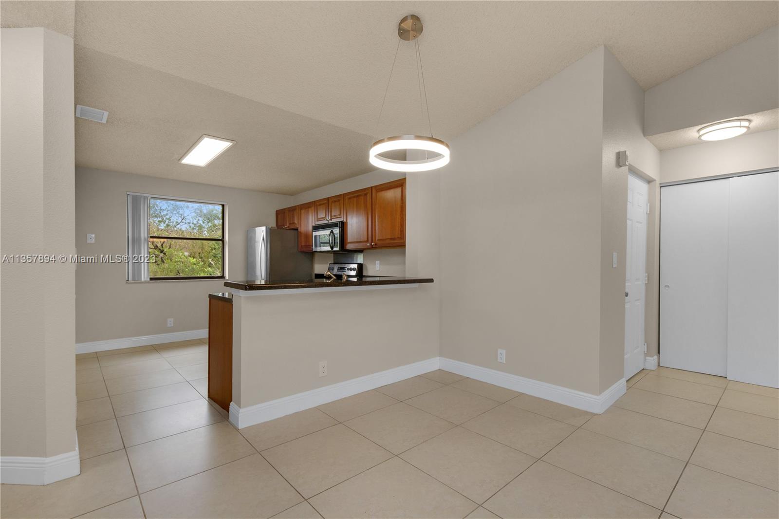 EXPERIENCE MODERN COMFORT IN SOUGHT-AFTER GRAND MARQUIS CONDOMINIUM AT PLANTATION! THIS COZY 2 BED/2 BATH BOASTS A RELAXING BALCONY OVERLOOKING THE GORGEOUS POOL. PORCELAIN TILE FLOORS THROUGHOUT, WOOD CABINETRY, AND UPDATED STAINLESS STEEL APPLIANCES WITH GRANITE COUNTERS IN THE KITCHEN. PLUS, ENJOY THE CONVENIENCE OF A WASHER AND DRYER IN UNIT! HIGH CEILINGS IN THE LIVING/DINING AREA, 2 ASSIGNED PARKING SPACES AND MANY GUEST PARKING SPOTS. CONDO AMENITIES INCLUDE: A COMMON POOL WITH WHIRLPOOL, SPRAWLING GARDENS WITH FOUNTAINS, TENNIS COURT, BBQ AREA, GYM, COMMON AREA ROOM, AND SECURITY WITH A GATED ENTRANCE. LOCATED CLOSE TO SAWGRASS MALL, SHOPS, RESTAURANTS, AND MORE, THIS GEM WON'T LAST! AVAILABLE TO LEASE STARTING MAY 6TH, 2023. PET WEIGHT LIMIT IS 30 POUNDS.