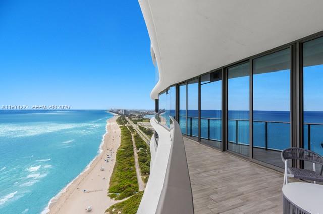 Welcome to Residence unit 3203 at the Ritz-Carlton Sunny Isles Beach is a beautiful 2-bedroom, 2.5-bath through-unit offering unobstructed ocean views to the east and city/Intracoastal views to the west perfect for enjoying daily sunrises and sunsets. The open-concept living area features floor-to ceiling glass, an oceanfront terrace, a sunset terrace, and elegant high-end finishes throughout. The gourmet kitchen includes premium appliances, custom cabinetry, and an oversized island ideal for entertaining. Both spacious bedrooms offer en-suite baths, including a luxurious primary suite with direct ocean views. Residents enjoy world-class Ritz-Carlton amenities such as beach and pool service, a state-of-the-art fitness center, full-service spa, oceanfront restaurant, concierge, and valet.