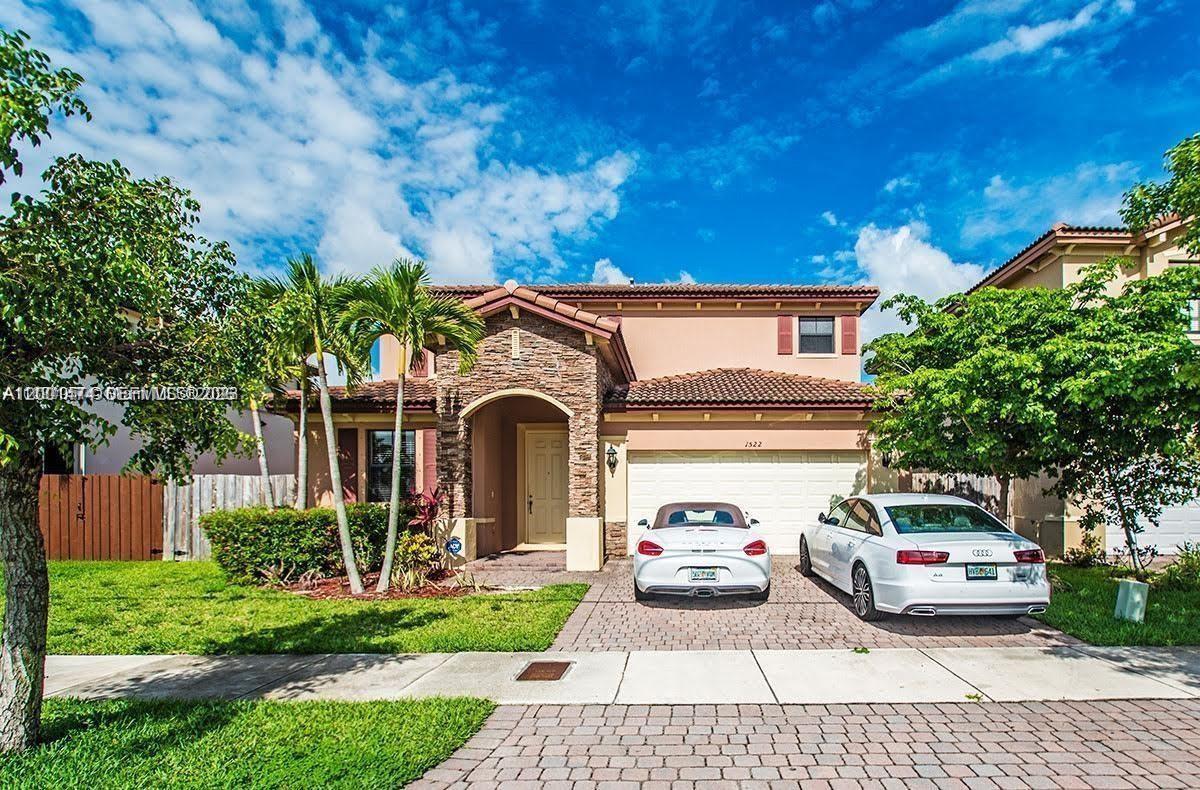 Huge Single-family Home in a Great Community in prime location near Coral Way & SW 147 Ave 5 beds 3 baths Big Patio with room pool , granite tops , close to great schools. one bedroom plus Den / office located in ground  floor .
