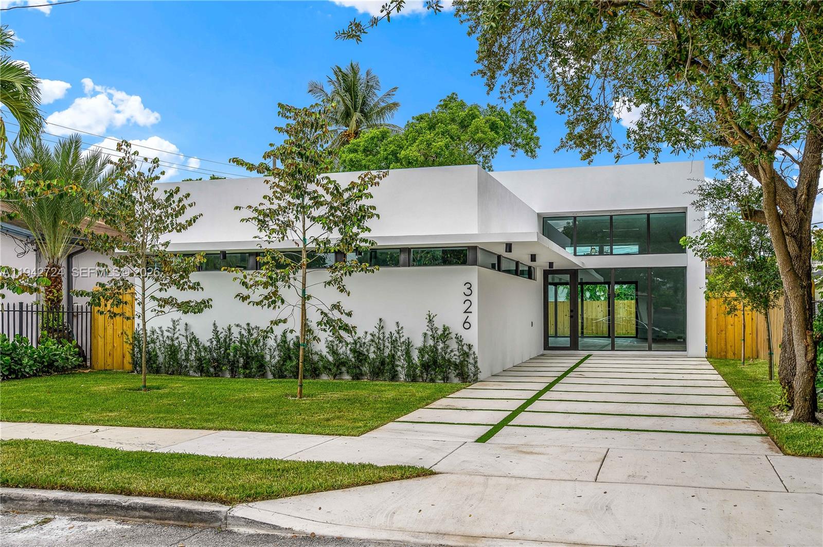 Newer construction luxury custom built home! Cutting edge architectural design featuring double-height ceilings and large glass windows & doors. A few blocks from the vibrant Miami Design District & it's high-end fashion houses, furniture showrooms and top-rated restaurants, sits this exquisitely designed new construction modern home with over 2,100 total SQ/FT. A model of sophistication, it showcases details that elevate the property to the next level. 3 bed 2-1/2 bath with open floor plan & large sliding doors over looking the pool. Impressive 13' ceilings in the living areas, real oak wood flooring, Grohe fixtures, impact-resistant windows/doors plus floor-to-ceiling kitchen cabinets with high-end appliances. Near Wynwood, Edgewater & Midtown.