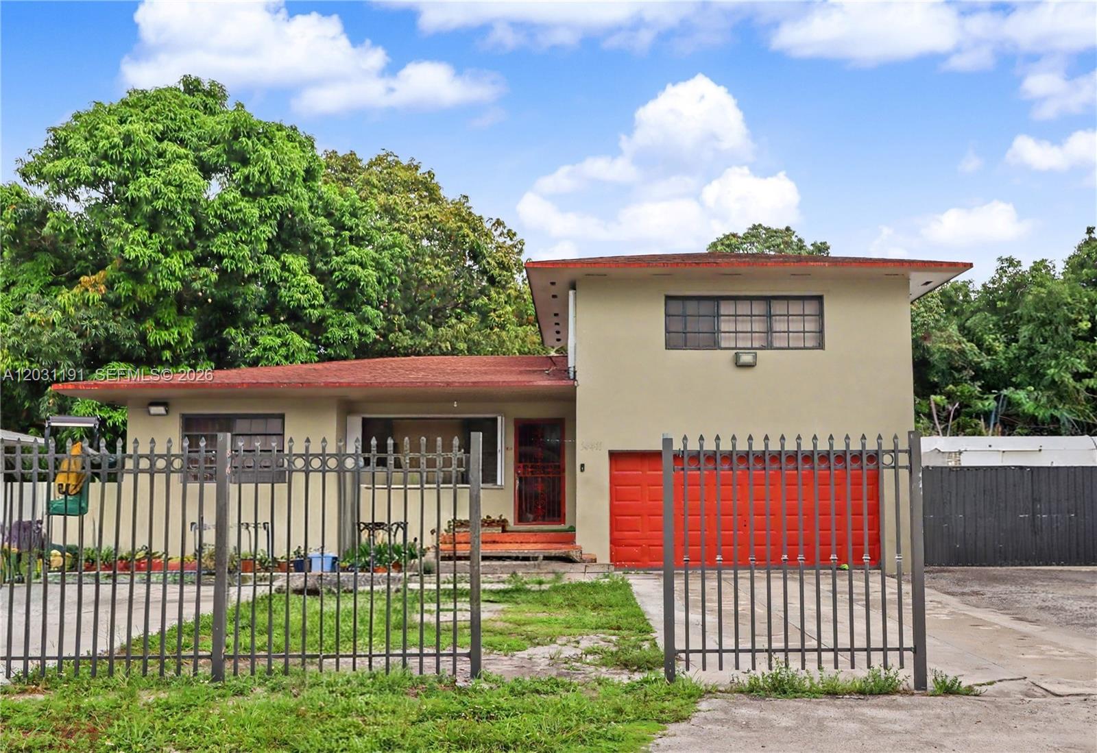 Unlock massive potential in the highly desirable Biscayne Gardens neighborhood! This property features an expansive lot with endless possibilities to build your dream lifestyle. Think bigger—there is plenty of room to expand the existing home or create an outdoor oasis. Plus, enjoy the ultimate convenience of dedicated space on the side to park your boat, RV, or toys. Don't miss this rare opportunity to customize a huge lot in a prime location. Bring your vision and make it yours!