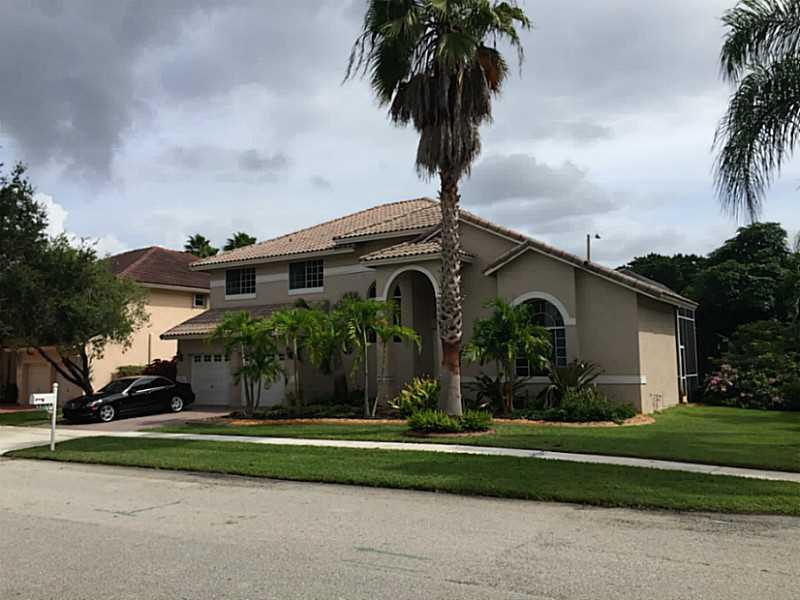 Spacious 4 bedroom 3 1/2 bath home in secluded gated Enclave development.  This huge 2 story home is ideal for families or executives.  One bedroom is located on the first floor and the grand master suite is located on the second floor.  Newly updated kit chen and appliances complete with center island.  Formal dining room and family room.  Huge screen patio covering the pool and  private terrace extending from the master suite.  Loft.  High ceilings, lots of storage and closets.  Close to great schools