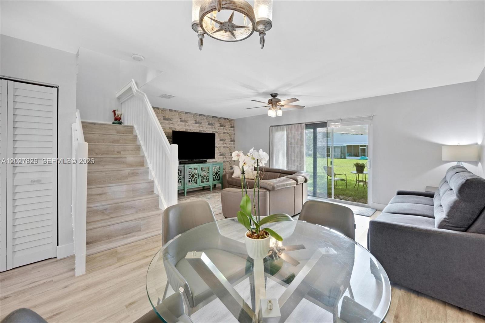 Step into comfort and style in this beautifully updated townhouse located in the gated community of Malibu Bay at Chapel Trail. Featuring two spacious primary suites with walk-in closets and private baths, this move-in-ready home showcases luxury vinyl flooring throughout, a tastefully renovated kitchen with quartz countertops and stainless steel appliances, updated bathrooms, and custom closet built-ins. One of the primary suites is enhanced by vaulted ceilings, creating an airy and inviting retreat. Recent upgrades include a new roof, new A/C, and newer washer and dryer. Two assigned parking spaces and a convenient exterior storage closet are included. Enjoy access to Malibu Bay's resort-style amenities, including a clubhouse, game room, pool, spa, gym, tennis and pickleball courts, basketball court, and gated security. Ideally situated between US-27 and I-75 with convenient access to the Florida Turnpike, and walking distance to Rose G Price Park, offering scenic walking trails, playground, sports fields, and an array of recreational areas, this home offers the perfect blend of connectivity and neighborhood charm. Close to top-rated schools, shopping, dining, and everyday conveniences, this is an exceptional opportunity to own in one of West Pembroke Pines' most sought-after communities.
