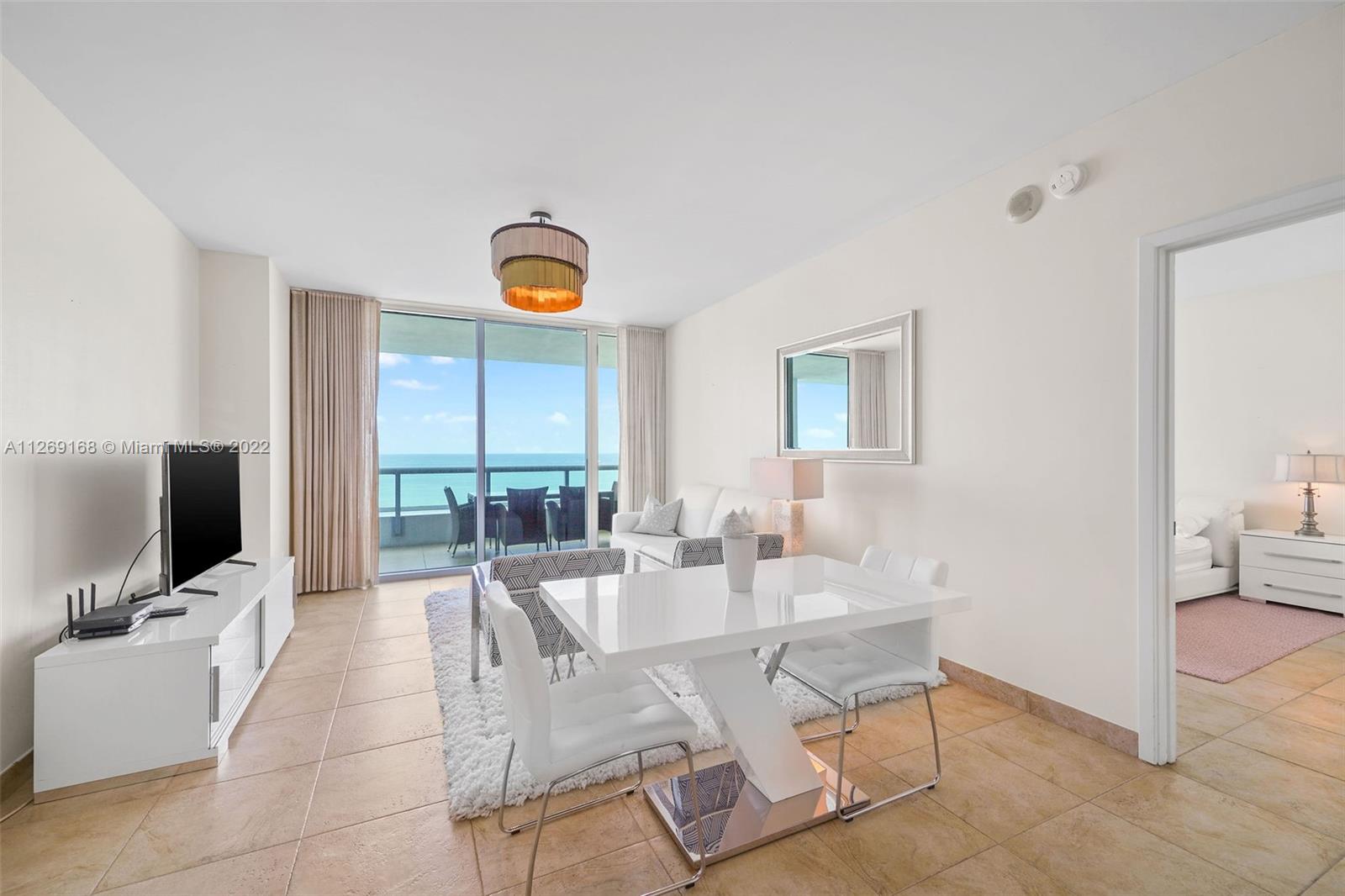 STUNNING DIRECT OCEAN VIEW from all room of the unit at renowned Carillon Miami Wellness Resort, recently named one of the top10 Destination Spa Resorts in US by Condé Nast Traveler Readers’ Choice.  Large/deep balcony spanning living and bedrooms for outdoor living and entertaining overlooking the ocean.  Classes offered 7 days-a-week, ALL included in rent.  Indoor connector to 70,000 sqft fitness/spa center.  Luxuriate in the myriad of thermal water therapies; 4 pools; bar; beach service; 24-hr security; valet; concierge, boutique; salon, Corner Store; wellness staff; café.  Enjoy the luxury, wellness lifestyle you deserve located in a walking neighborhood with all conveniences, including Publix across the street.  Not offered at this time for only winter season.  Annual lease preferred.