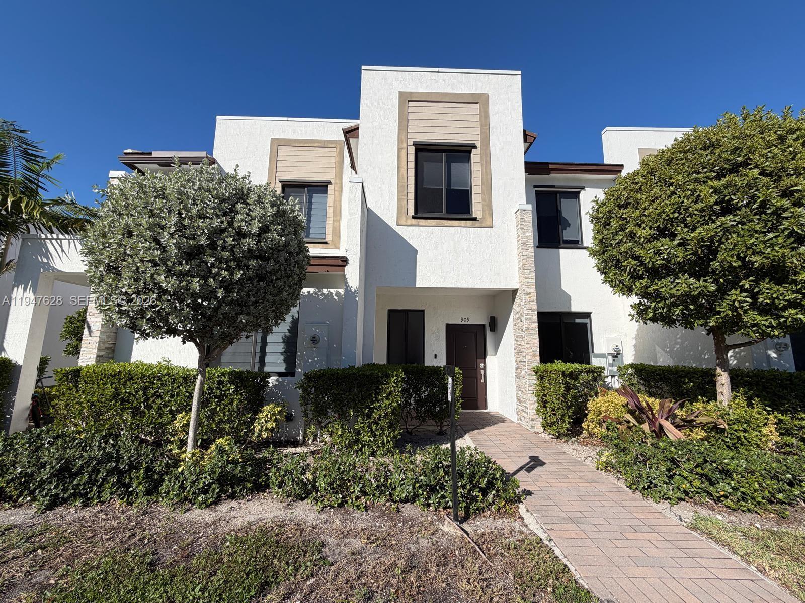 Built in 2022, this 3-bedroom, 2.5-bath townhouse offers close to 1,500 square feet of thoughtfully designed living space. The home features a bright, open floor plan with a generous family room, complemented by tile floors and laminated wood flooring on the second level. Step outside to a private backyard patio, perfect for outdoor dining, entertaining, quiet sports, and relaxing weekends. Residents enjoy private access to exceptional resort-style amenities, including a swimming pool, fitness center, clubhouse, lake with walking trails, park, and soccer field. Ideally situated near major highways, shopping, and dining, this move-in-ready property is an excellent opportunity for its next owner.