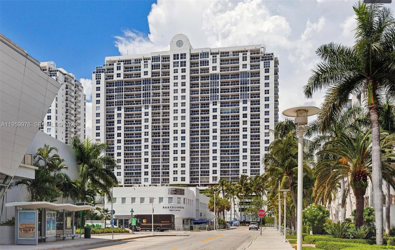 Bright 2BR/2BA in Sunset Harbour North with walls of glass, eastern light, and open city views. Features large dining area, full-size W/D, white kitchen with newer stainless appliances, smooth ceilings, and a stroll-in California Closet. One deeded garage space + free valet. Two bayfront pools incl. Yacht Club pool, gym, sauna, hot tub, BBQ, 24/7 doorman/security. Pet-friendly building with new lobby.Close to marina, baywalk, Publix, Barry’s, The Standard & Lincoln Rd. Special assessment paid in full covering elevators, pool/deck, concrete & building envelope—supports 30-year inspection.