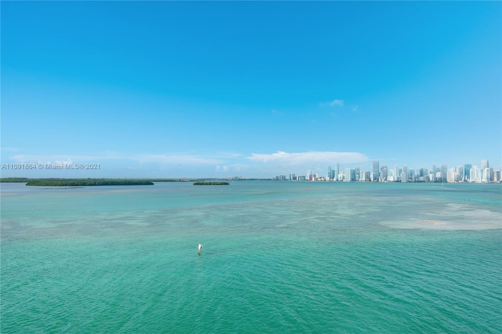 This stunning 8th floor Bayview unit has been expertly renovated - no expense spared with attention to every design detail. This sleek modern 6BR (incl. staff bedroom)/5+1BA showcase unit features 6,700 SF, exquisite Gray Milano marble & French Oak Floors, & 2 expansive terraces w/ Fisher Island, Miami Beach, Ocean, Virginia Key, Bay & Downtown Miami sunset views. Spacious open layout w/extended living, dining & family areas perfect for entertaining w/Control 4 automated Smart home system. Chef’s kitchen w/eat-in quartz center island, top-of-the-line Gaggenau & Sub-Zero appliances, plus a breakfast room. Sumptuous bay-facing principal suite w/gas fireplace, custom built closets, an executive size office & spectacular principal bathroom w/white matte glass floors/walls & walk-in rainshower