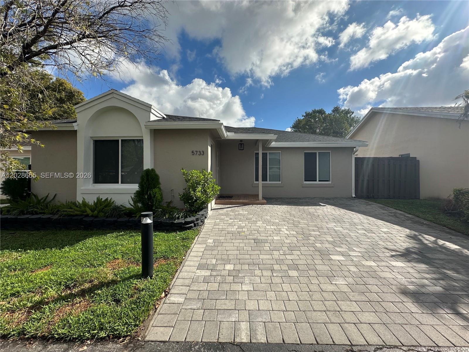 Stunning single-family home in the prestigious gated community of Doral Park. Fully furnished and recently remodeled, this upgraded residence features a new roof, impact windows and doors, central AC, water heater, and stainless appliances. The interior boasts porcelain flooring, custom-made closet cabinetry, and blackout window treatments in all bedrooms. A chef’s kitchen offers soft-close cabinets and quartz countertops. Modern tech includes a Nest thermostat and doorbell, plus a whole-house water filtration and alkaline system. Relax on the private screened patio. Located in Doral, famous for top-tier schools and parks, residents enjoy full Doral Park Country Club access: resort pool, sauna, gym, tennis and pickleball courts, a kid's playground, and on-site restaurant. This turnkey home comes fully equipped with beautiful furniture, TVs, kitchen utensils, and a Nespresso coffee maker.