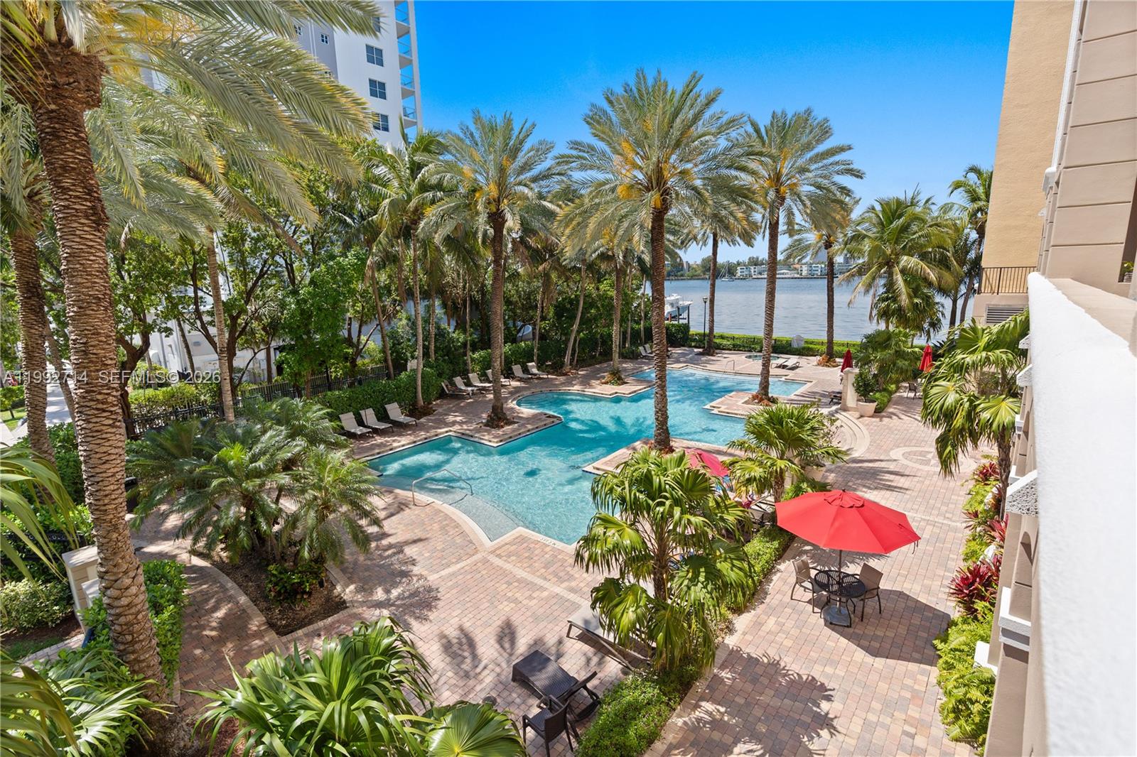 Stunning waterfront condo in the heart of Sunny Isles Beach offering 3 bedrooms and 2 bathrooms with a functional open layout. The spacious kitchen seamlessly connects to the dining and living areas, creating an ideal space for both everyday living and entertaining. Enjoy beautiful pool and bay views, along with the convenience of a washer and dryer in the unit. The residence includes two assigned parking spaces and is located within a gated community with 24/7 security, providing both comfort and peace of mind.
The community offers a true resort-style lifestyle with heated pools, jacuzzi, a modern fitness center, bike storage, kids’ playroom, business center, and conference room. Pet-friendly, making it perfect for pet owners.
Ideally located within walking distance to the beach and surrounded by A-rated schools, top restaurants, shopping, and parks. Perfectly positioned between Bal Harbour Shops and Aventura Mall, and to both Miami and Fort Lauderdale airports. Whether you are seeking a primary residence, vacation home, or investment opportunity, this property delivers exceptional waterfront living in one of South Florida’s most desirable locations.