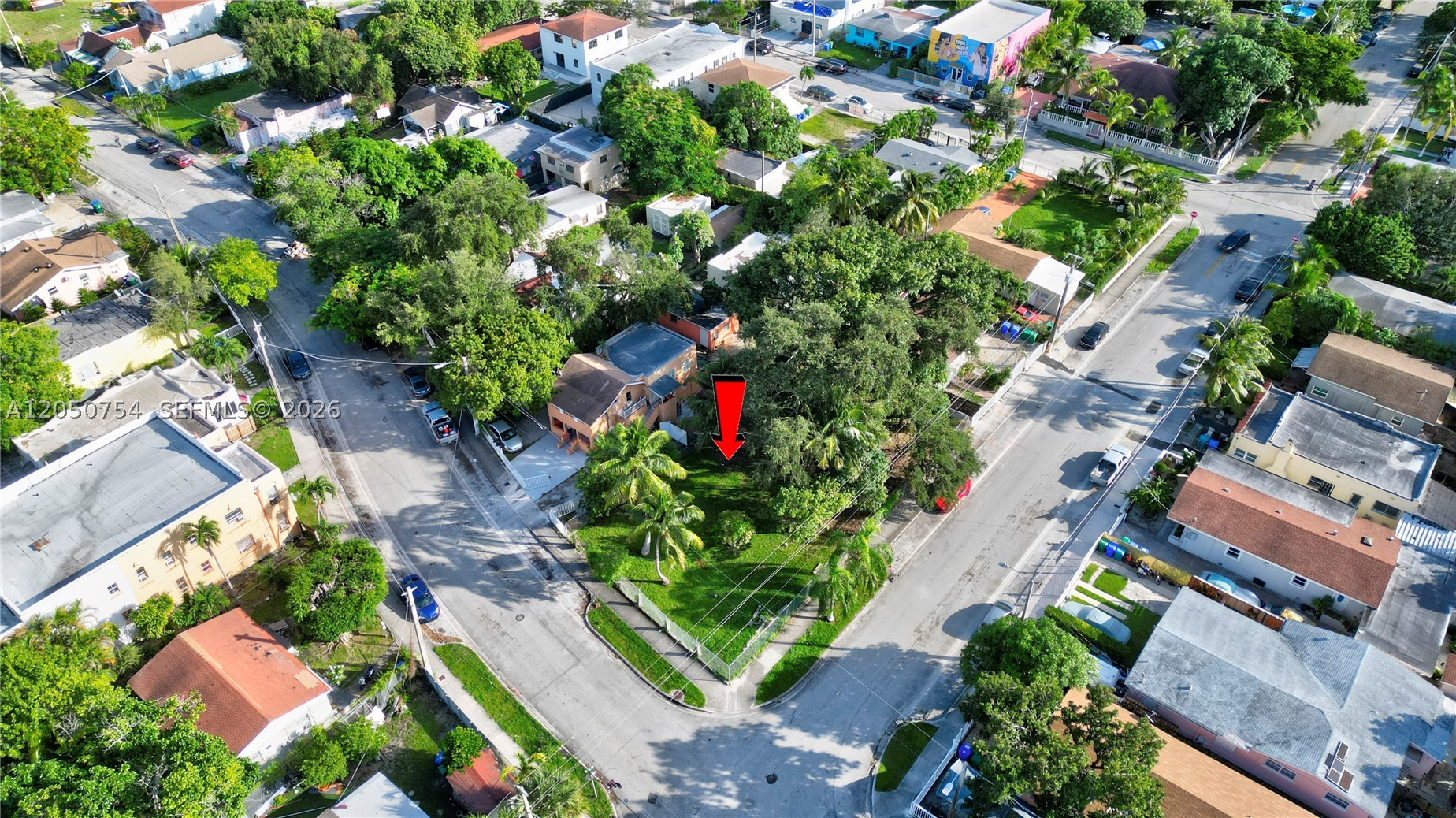 Exceptional investment and development opportunity in Wynwood Norte. This prominent 12,776 SF corner lot combines immediate income from a legal, stabilized 4-unit property with compelling future development potential. Zoned T4-R NRD-2, the site may allow up to 4 stories and approximately 40 residential units, or a potential mix of residential and commercial uses, subject to applicable regulations and buyer due diligence. An ideal opportunity to generate rental income while positioning for future redevelopment in one of Miami's most dynamic and evolving neighborhoods, surrounded by continued investment and residential growth. The property's corner location, substantial lot size and current income stream create a unique opportunity for developers and investors seeking flexibility, visibility and long-term upside. Located near major employment, dining, entertainment and cultural destinations, the site benefits from the continued transformation of the greater Wynwood area and strong demand for urban living. Its strategic location offers excellent connectivity to Downtown Miami, the Design District, Midtown and major transportation corridors, enhancing its appeal for future development. This is a rare chance to secure a sizable corner parcel in a high-growth urban neighborhood while benefiting from in-place income today. Detailed rent roll and expense information is available in the attached flyer. Drive by only; please respect tenant privacy and do not disturb occupants.