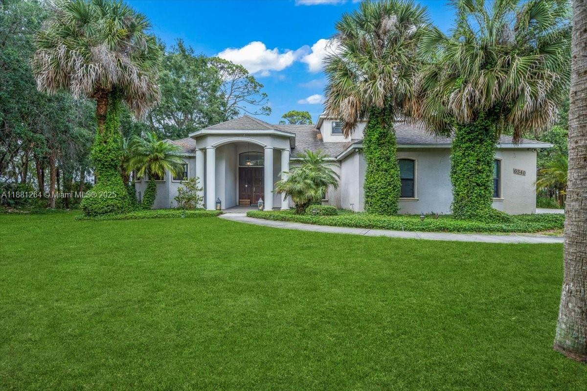Rare Waterfront Home in a peaceful community with Space Launch Views!  Experience breathtaking, million-dollar views from this exquisite 5-bed, 4-bath with 3,727 living sq ft. This 2 story home offers privacy, comfort, & stunning rocket launch views. 2 master suites, gourmet kitchen, hardwood floors, open layout, perfect for short-term rentals or executive retreats. High Income potential for investors net approx $130k annually. Beautiful outdoor entertaining with salt water pool to enhance the guest experience. This rare waterfront gem is a prime investment opportunity in one of Florida's most dynamic markets. Nestled among nature & majestic shade trees, this custom-built home offers an unparalleled blend of elegance, privacy, & tranquility.