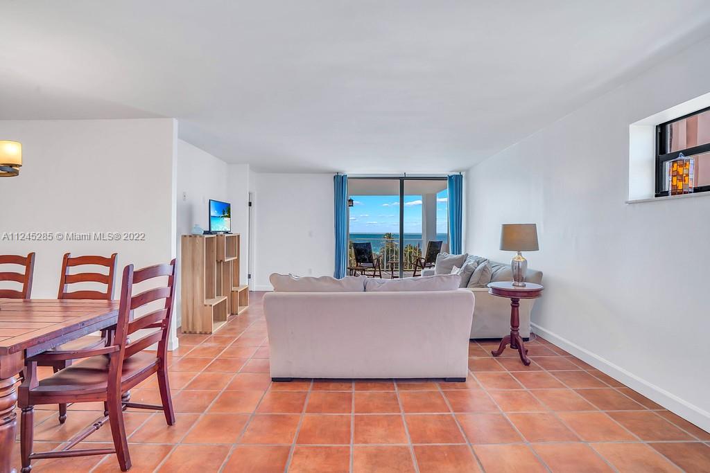 Spacious & bright split floor plan 2/2, with unique views of both ocean, sunrise & sunset.
Mexican tile flooring, beautifully kept unit with new A/Cs & impact windows. Quiet corner unit with Walk in closet in master and a large terrace facing the ocean. In move in condition or ready for your own twist on several creative remodel ideas. Very rare 2 parking spaces. A truly well kept building, with an engineer's 2021 clean bill of health report. Complete stucco & window restoration, as well as a new chiller & cooling tower. Pet friendly building. Maintenance inc. premium cable & H/S internet, . No special assessments. A delightful neighborhood, children's playground, a beachwide boardwalk, restaurants, banks, Publix,drugstores, dry cleaners, hair salons & all daily needs a short walk away.