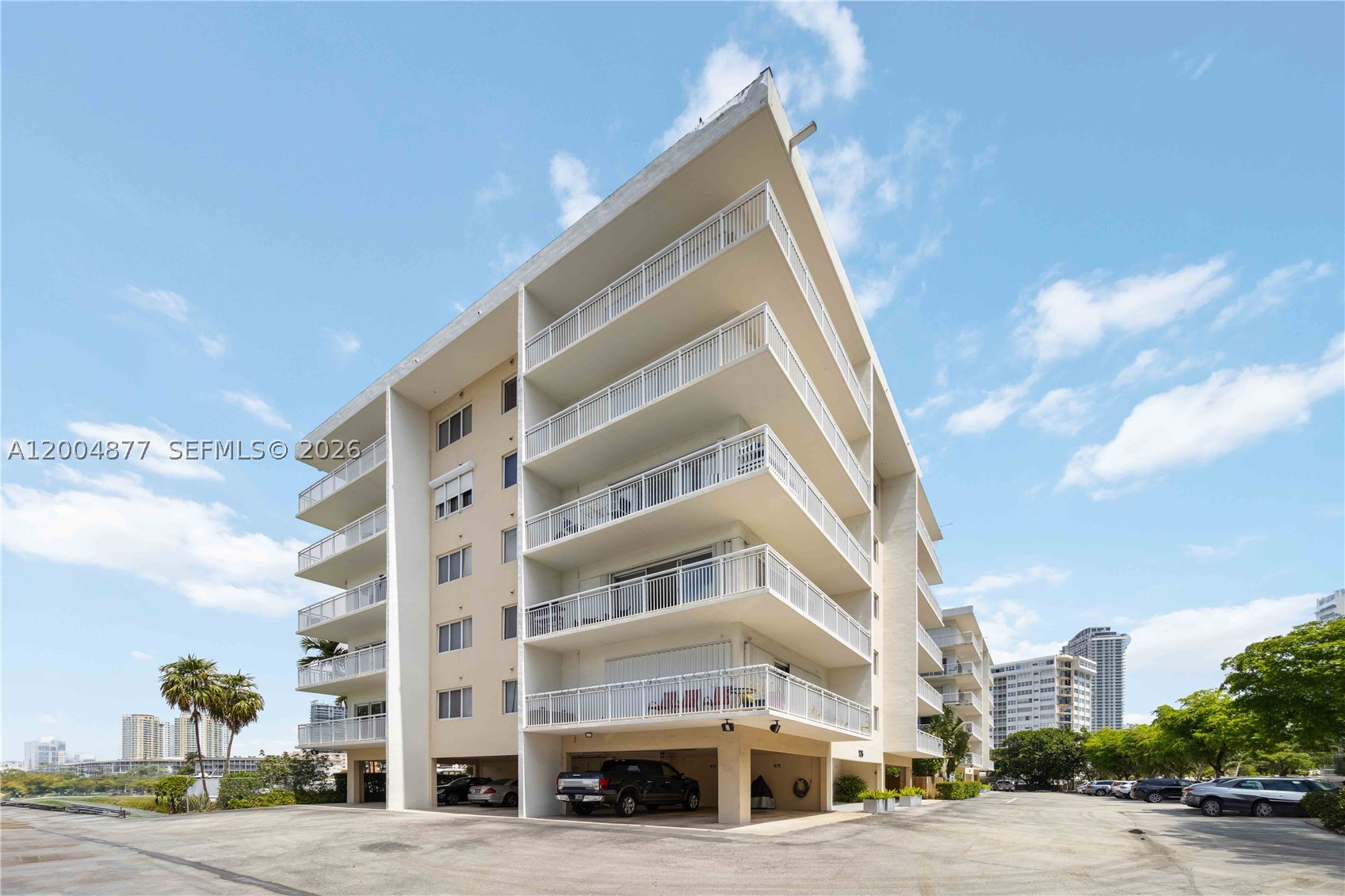 Rare waterfront corner unit in an exclusive boutique building with only 4 units per floor — offering the privacy and prestige you'd expect from a true luxury residence. Enjoy sweeping northwest exposure and a wrap-around balcony with stunning partial Intracoastal views, perfect for watching sunsets over the water.
Inside, the bright and airy open-concept layout features 2 bedrooms and 2 full baths, designed with a sleek modern aesthetic throughout. The chef's kitchen impresses with granite countertops, rich wood cabinetry, stainless steel appliances, and a stylish sit-down bar — ideal for entertaining. Impact windows and shutters provide year-round peace of mind.
Resort-style community amenities include a heated pool, BBQ area, 1 covered deeded parking space + 1 uncovered spot, and 2 private storage units. Complimentary laundry on every floor adds everyday convenience.
The crown jewel: direct ocean access for boating enthusiasts, with dockage available via waitlist. Whether you're seeking a full-time residence or vacation retreat this property delivers on every front.