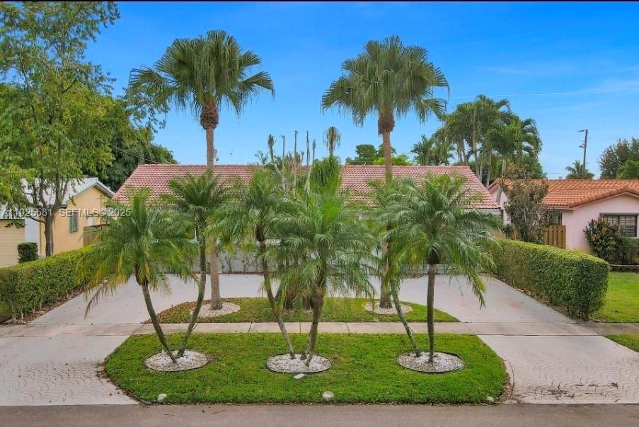 Welcome to this charming corner-lot home in the heart of Hollywood! This well-maintained property features a bright and open layout, spacious bedrooms, and an update kitchen perfect for everyday living. Enjoy a large fence yard ideal for entertaining and also equipped with in-law quarter and a pool. The home offers plenty of natural light, tile flooring throughout, and ample parking including a driveway and additional street parking. The home has a built-in movie theater room.  Conveniently situated just minutes from major highways, Hard Rock Casino, shopping, restaurants, schools, and Hollywood Beach. Whether you're a first-time buyer or an investor looking for a strong rental opportunity, this property is a must see