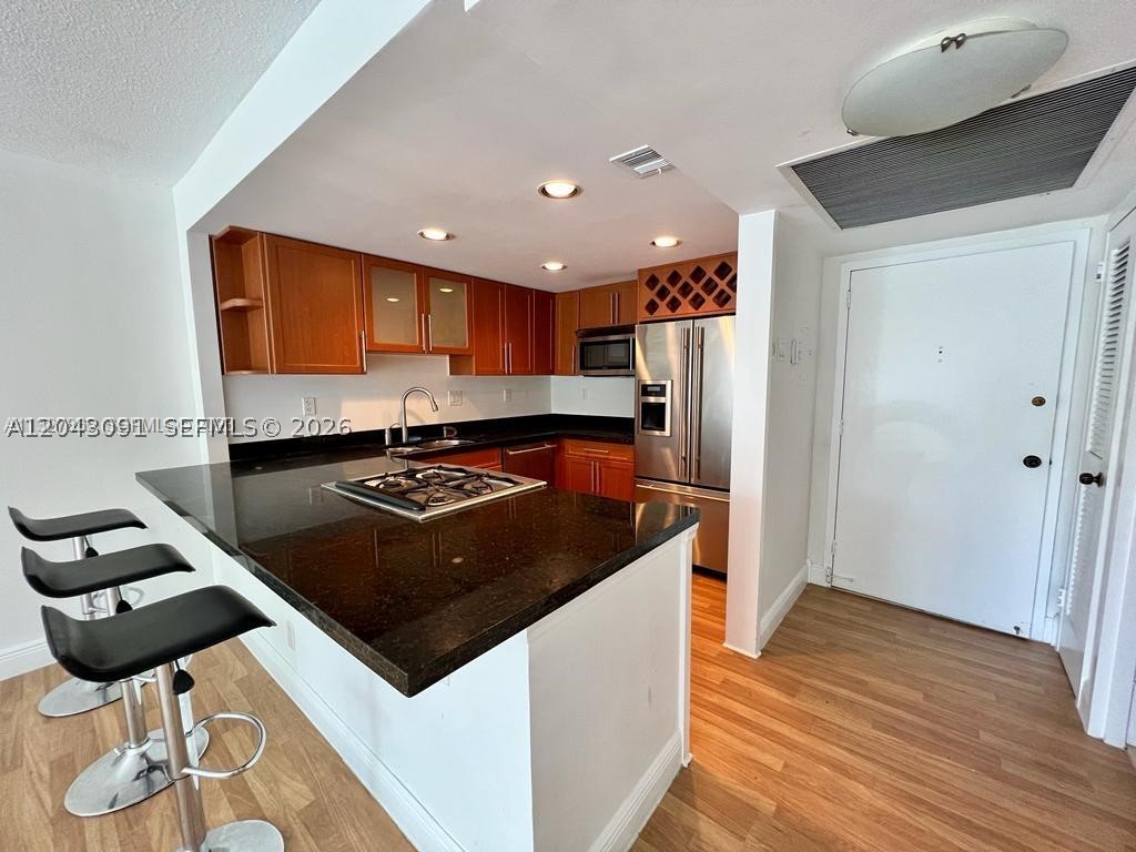 Live Oceanfront at This Full Amenity Property! Private Beach Access, Interior Fully Updated, Freshly Painted Ready for You to Move In! Great balcony. Hurricane Windows and Doors. INCLUDES: Water, Gas, Pest Control, Assigned Parking for 1 Vehicle. Tenant Pays Electricity (Avg electric bill is $25-$35/mo) and WIFI.
