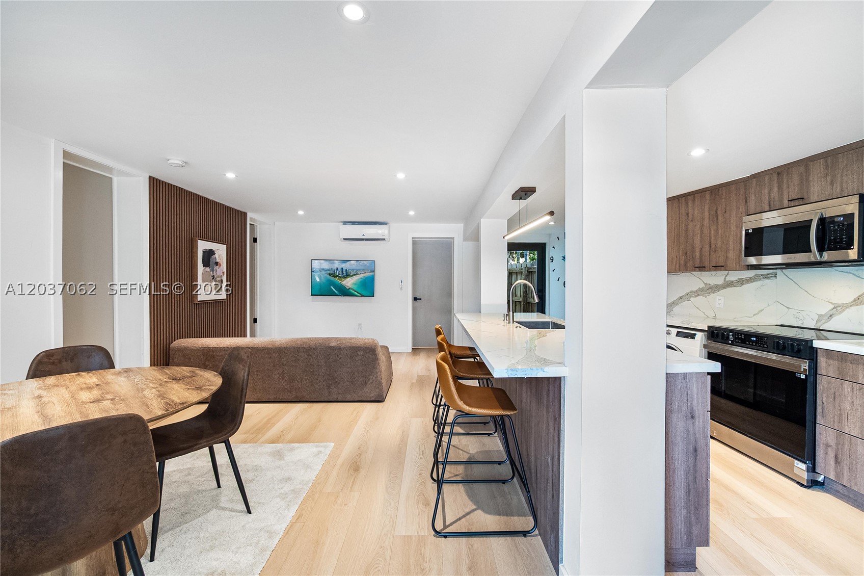 This is a modern and luxurious 2bed/1bath unit located in the highly sought after East Shenandoah. The unit is in pristine condition and every detail has been carefully designed. Parking is included on the driveway and has an EV charger in case needed. The interior has a modern layout integrating all the common spaces. Starting with the ample kitchen it has a very sleek & lux feel and includes all brand new stainless steel appliances (refrigerator, oven, microwave, dishwasher, washer, dryer). The unit comes fully furnished and includes the water and wifi. A standout feature is the bathroom with its luxurious new tile and rain shower that has plenty of water pressure. The exterior offers a private patio/patio furniture.