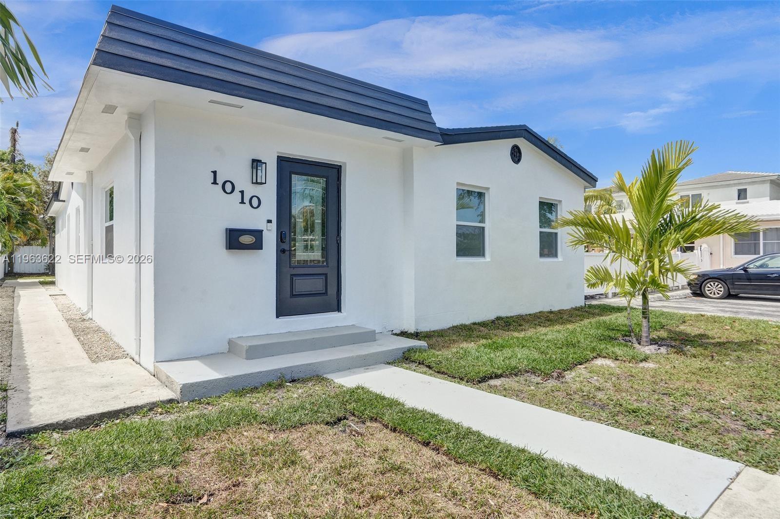 Beautifully upgraded home located in the heart of Hollywood offering style, comfort, and modern upgrades throughout. This move-in-ready property features a bright and spacious open floor plan designed for today’s lifestyle, seamlessly connecting the living, dining, and kitchen areas perfect for both everyday living and entertaining. The kitchen is equipped with stainless steel appliances, elegant quartz countertops, and ample cabinetry, creating a clean and contemporary feel. The bathrooms have been tastefully upgraded, and the home showcases brand-new tile flooring, along with fresh interior and exterior paint that gives the entire property a crisp, polished look. Major improvements provide long-term value and peace of mind, including a brand-new roof completed in 2025 and impact windows throughout. Currently tenant-occupied through November 16, 2026, at $3,500 per month, this property presents an excellent opportunity for investors seeking immediate rental income, while also appealing to future homeowners planning ahead. The seller is motivated and will respond to offers the same day. Don’t miss this opportunity to own a beautifully renovated property in a prime Hollywood location.