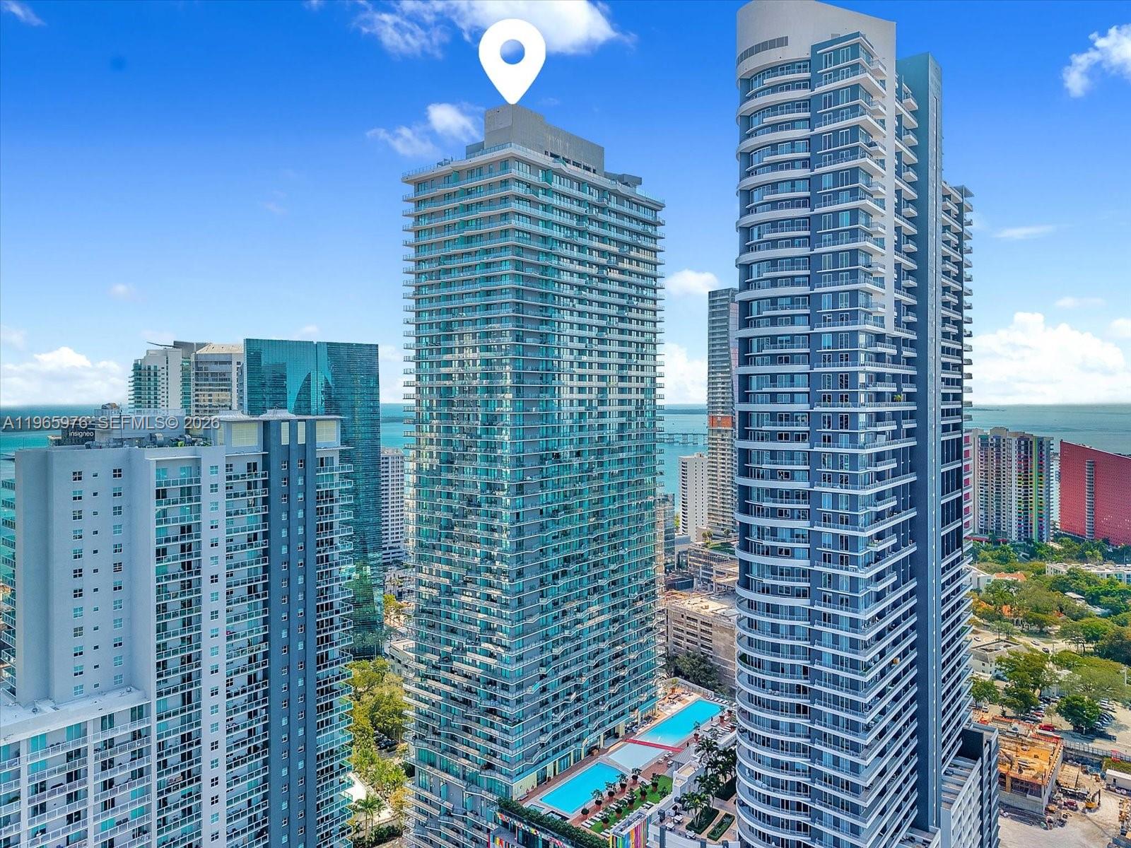 Experience elevated living in this high-floor 1BD/1BA residence at DUA Residences, Brickell. Featuring floor-to-ceiling windows, upgraded ceramic flooring throughout (both indoor and outdoor), an updated bathroom, modern kitchen, and a spacious balcony with views of the water. DUA is an exclusive high-rise building offering a rooftop pool, gym, movie theater, and 24-hour security, among other amenities. Ideally located in the heart of Brickell, steps from world-class dining, shopping, and entertainment, with easy access to I-95, US-1, and public transit. A prime opportunity to live or invest in Miami’s most vibrant urban core.

Owner-Agent: A partial ownership interest in this property is held by a licensed Florida Real Estate Broker.