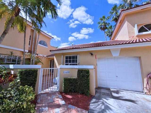 A beautifully maintained 3-bedroom, 2-bath townhome located in the Portofino community offering comfort, style, and convenience in a prime location. This move-in-ready home features an upgraded kitchen, updated bathrooms, fresh interior paint, and ceiling fans in every room for added comfort. Enjoy spacious bedrooms and bathrooms, along with tile and laminate flooring throughout for easy maintenance and a modern feel. The 1-car garage provides added storage and convenience, while the desirable location puts you just minutes from Publix, banks, shopping, dining, and everyday essentials. A wonderful opportunity to own a stylish and well-kept home in the heart of Coral Springs.