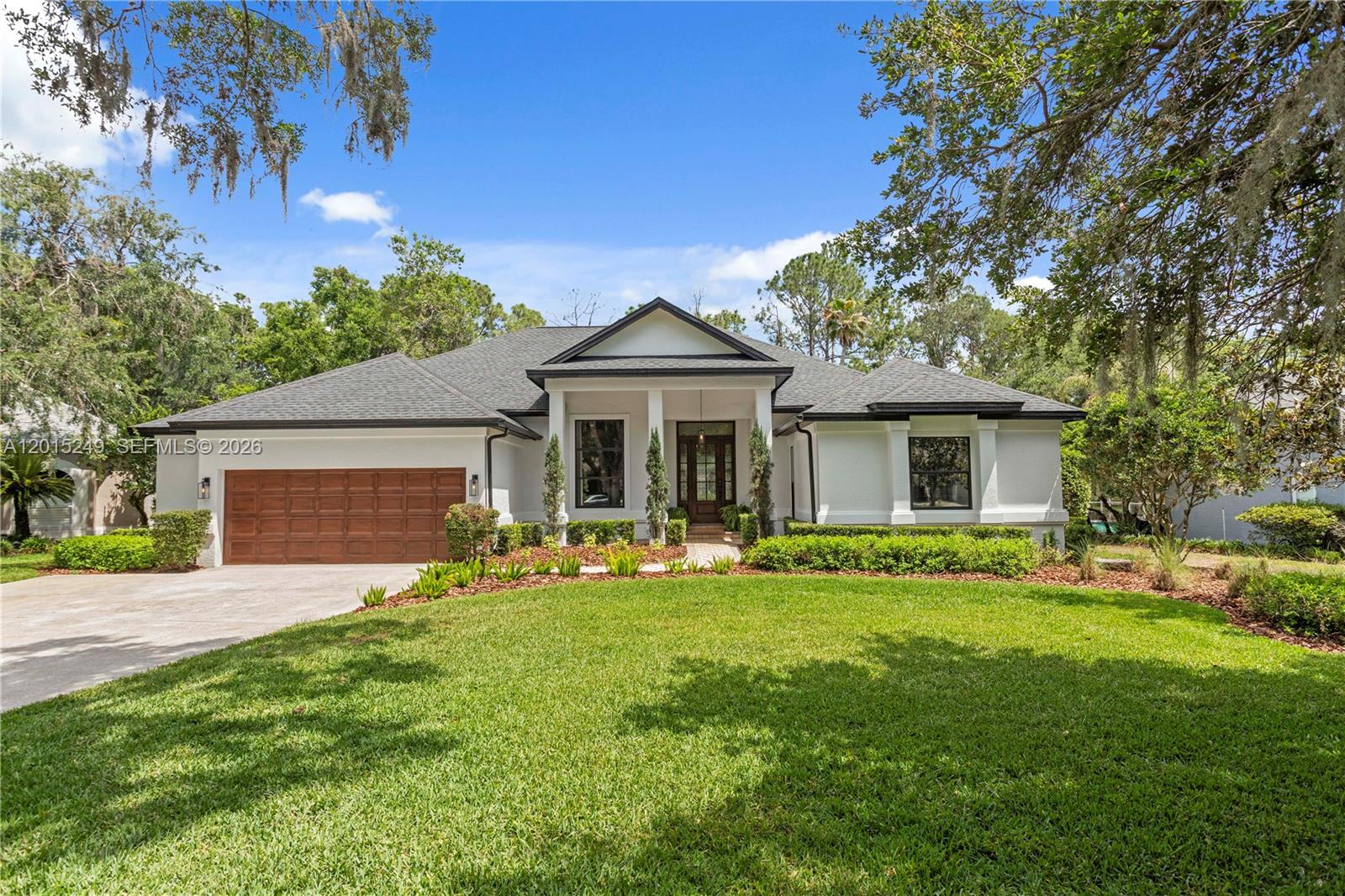 In River Hills, location is everything, and this single story pool home delivers it beautifully. Positioned along the second hole of the golf course, the home sits on an oversized cul de sac lot with a long, tree lined front yard and a memorable sense of arrival. Inside, expansive formal living and dining rooms create a natural place to host. The family room is grounded by a beautiful floor to ceiling fireplace, bringing warmth and focus to the center of the home. The kitchen brings a modern, sophisticated feel with Samsung appliances, breakfast bar, walk in pantry, custom oversized window, and smoky glass tile backsplash. Throughout the home, white wood french doors soften the interiors. Wood flooring, high ceilings, crown molding, and updated fixtures create a clean, timeless look. The split floor plan gives the primary wing privacy and direct access to the pool lanai, with secondary bedrooms thoughtfully placed throughout. With 4 bedrooms, 3 baths, and about 3,000 square feet, the home delivers function, style, and lasting appeal. Updates include a 2021 roof, 2021 exterior paint, 2020 entry door, and 2026 pool pump. River Hills brings guard gated privacy, golf cart ease, sidewalks, parks, playgrounds, and established country club amenities. For buyers seeking a pool home with presence, privacy, and a true golf course setting, this is the one to experience in person. Book your private showing today!
