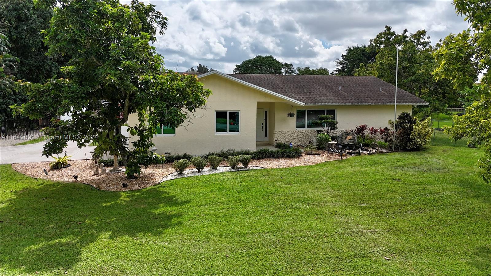 Wonderful, spacious, and open concept home with 4 bedrooms, 3 full bathrooms, and a split bedroom floor plan. Spacious master bedroom overlooking the pool area. Newer kitchen cabinets and quartz countertops.  This home is perfect for entertaining with a screened pool deck connected to an indoor bar area and a full bathroom. The 1+ acre property is completely fenced, and has a newly installed riding arena and enough space for boats, RV's, and trailers. It also has a gas generator that offers peace of mind of having electricity on the entire property in case of any power outage. Embrace the wonderful experience of living the equestrian lifestyle and the opportunity to enjoy the nature of Southwest Ranches.