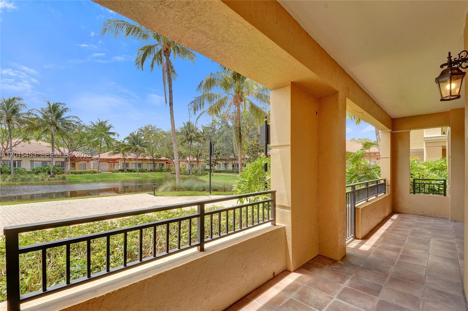Welcome HOME to the Island House of The Palms at Weston, the sought-after, guard-gated 55+ community.  Whether you are in your 60s, 70s or 80s, there is something here for you.
This beautiful first-floor residence offers stunning lake views and direct access to the walking path from your private patio gate. Your new home combines comfort, style, and convenience in one of Weston’s premier communities.
This spacious light-filled 3 bedroom, 2 ½ bath residence features an open-concept layout with elegant neutral flooring throughout, crown molding, recessed lighting, and impact glass windows & doors. The kitchen showcases wood cabinetry, granite countertops, stainless steel appliances, and a bar area perfect for casual dining.
The primary suite offers a peaceful retreat with a large walk-in closet, double vanities, separate shower, and a custom walk-in bathtub. The laundry has a newer washer and dryer and a laundry tub.  A private storage unit conveniently located on the 4th floor in the Island House.
Enjoy resort-style living with luxury amenities including a pool and spas, fitness center with sauna and steam room, concierge services, valet parking, clubhouse, social room, library, card room, beauty salon, restaurant, & more. Maintenance includes cable, internet, water, trash, and a quarterly restaurant credit. Ideally located near Publix, restaurants, boutiques, pharmacies, Cleveland Clinic, and major highways. This low-maintenance waterfront living is ready for you!