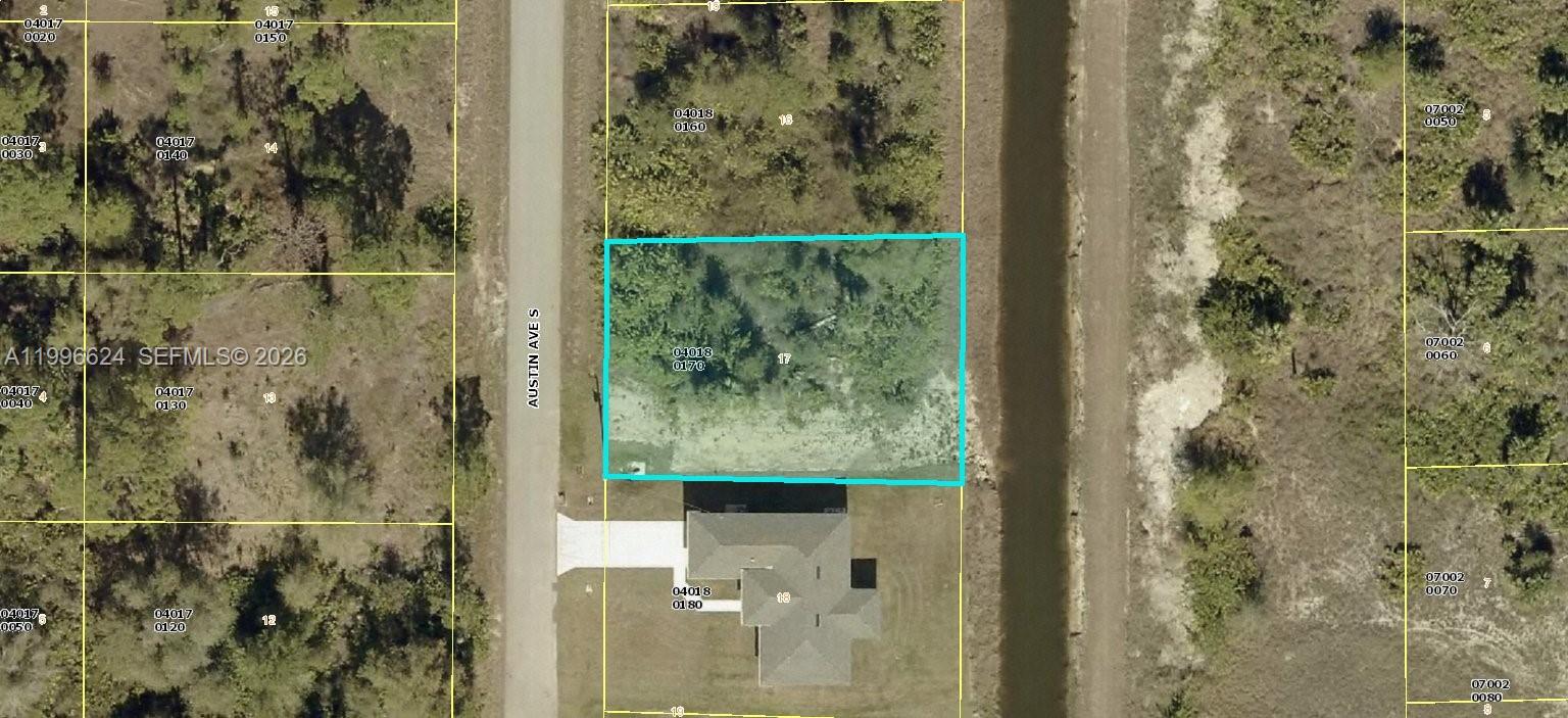 Lowest-Priced Lot in in this area! No Deed Restrictions! This spacious and affordable vacant lot is the perfect opportunity to build your dream home or make a smart real estate investment. Located in a quiet area away from the city’s hustle and bustle, this residential lot offers peace, privacy, and plenty of potential. The property is zoned for single-family residential use and has no deed restrictions, giving you the freedom to design and build as you wish. Surrounded by new construction homes and conveniently close to shopping, schools, and major roads, this is your chance to own land in one of Southwest Florida’s fastest-growing areas.