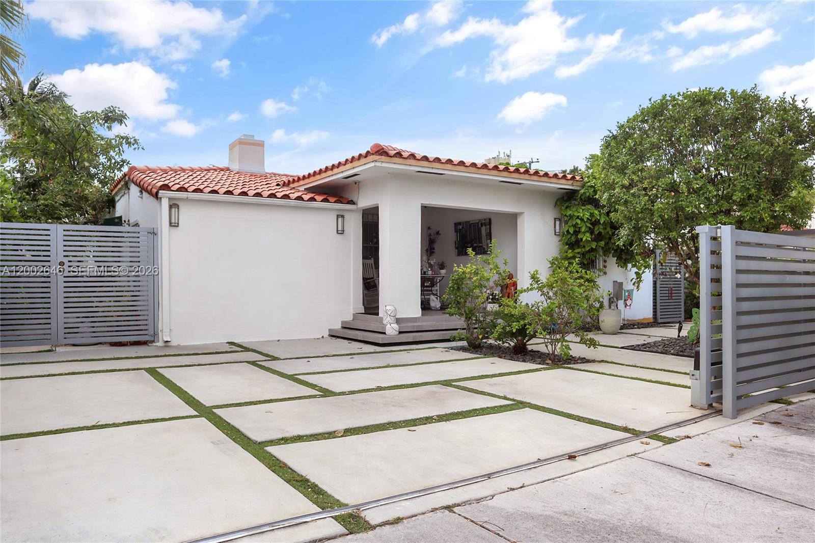 Located just minutes from Coral Gables, this versatile property offers strong income potential or multigenerational living in a prime Miami location. The main home features a well-maintained 3-bedroom 2-bath layout filled with natural light and thoughtfully designed living spaces. Plus a separate 1-bedroom 1-bath side unit that may serve as a private in law suite or rental income, complete with his own entrance and kitchenette. What truly sets this property apart is the back of the home includes a studio apartment with a private entrance, full kitchen, bath and patio-ideal for a guest or an opportunity to further maximize income potential. All improvements done to Code and permitted. Conveniently located near major roadways, dining, and amenities.