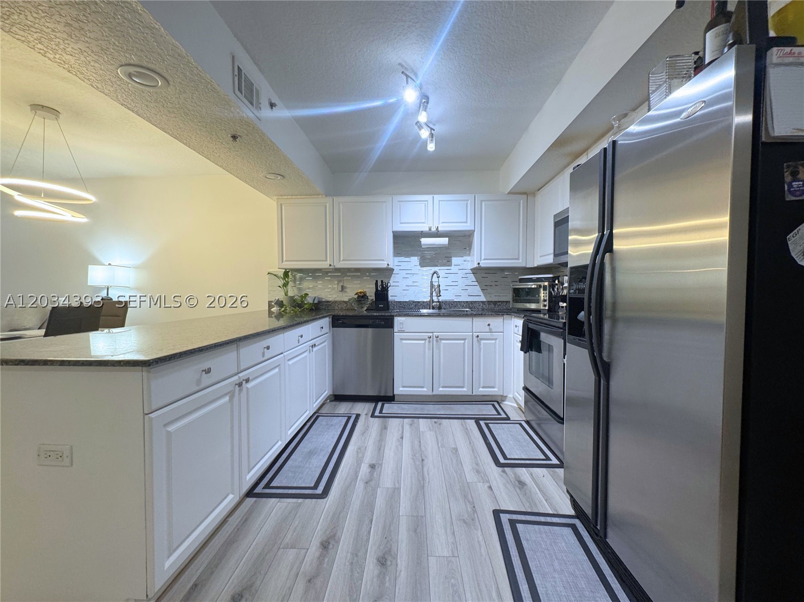 RIVERBEND TOWNHOMES CONDO - Residential Lease
