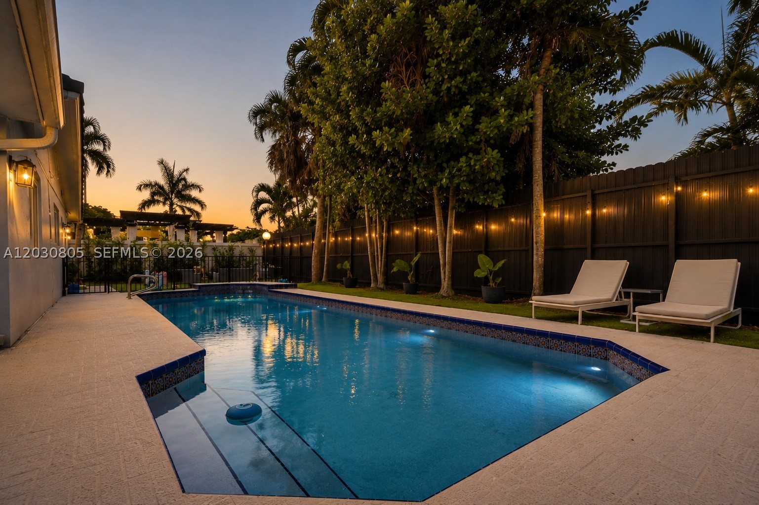 PRICED TO SELL in Country Club of Miami Estates! This beautifully updated 3-bedroom, 3-bath residence offers the perfect blend of comfort, style, and South Florida living. The open floor plan seamlessly connects the living, dining, and family areas to a spacious kitchen with oversized island, creating an ideal setting for everyday living and entertaining. The luxurious primary suite serves as a private retreat featuring a renovated spa-style bathroom with soaking tub, separate shower, dual vanities, and a custom California Closet. Impact windows and doors, a newer roof (approximately 10 years old), heated pool, circular driveway, and 2-car garage complete this exceptional home. Located within the private guard-gated community of Country Club of Miami Estates with 24-hour security and roving patrol, this property offers a unique opportunity to enjoy one of Miami-Dade's most sought-after neighborhoods.